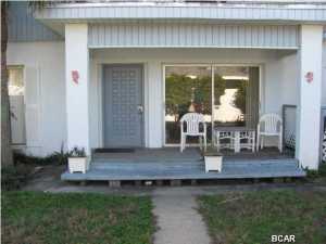 Gulf front 2 bedroom, 1 bath downstairs unit. Great view of the Gulf. Open patio with in ground pool (service provided). Shared laundry area