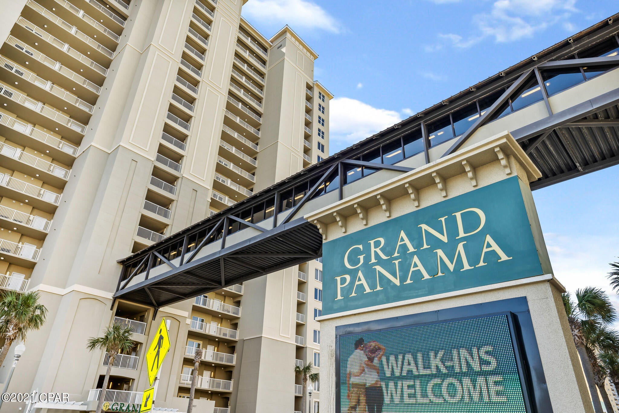 Grand Panama Beach Resort, Tower One, 10th Floor! Gulf-side Primary Bedroom with balcony access. Great Balcony views. Tile flooring decors the hallway, kitchen & bathrooms. Bunk Alcove.