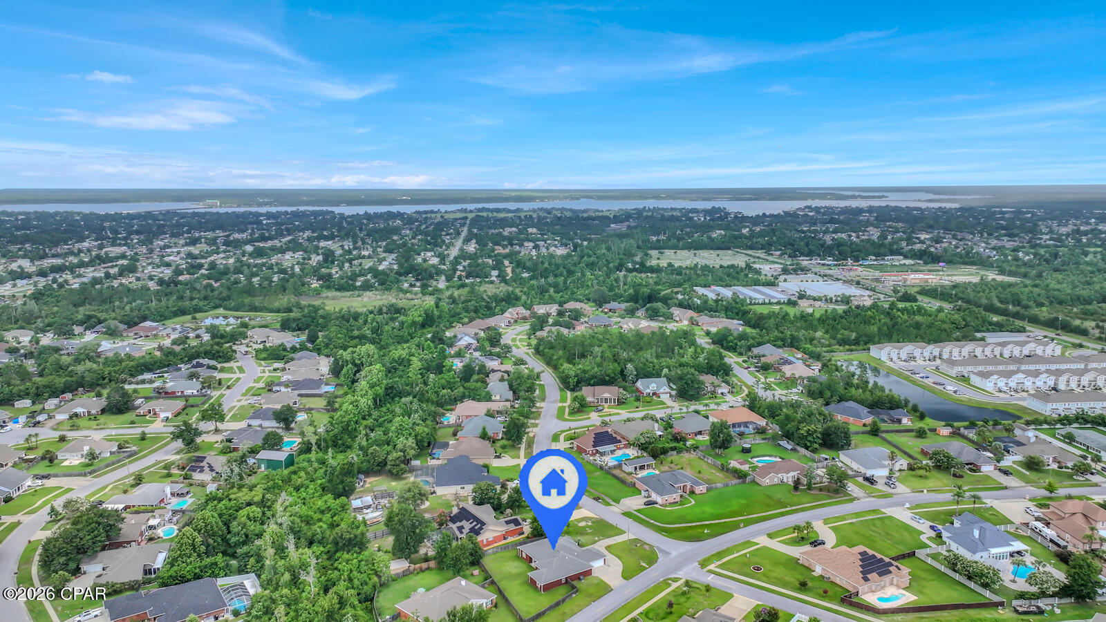 Set on nearly an acre in the sought-after Mowat Highlands neighborhood, this custom, all-brick home offers the kind of space and flexibility that is increasingly hard to find. Meticulously maintained by its original owner, the home features 3,199 square feet of single-level living with four generously sized bedrooms, three-and-a-half bathrooms and multiple spaces designed for both everyday comfort and entertaining.
Inside, soaring cathedral and tray ceilings, crown molding and custom window treatments give the home a sense of character and craftsmanship. Two spacious living areas are connected by a beautiful double-sided fireplace, while the formal dining room, private study and light-filled breakfast area provide plenty of flexibility for working, gathering and relaxing. The kitchen sits at the center of the home with a large island, solid-surface countertops and stainless-steel appliances.
The expansive primary suite feels like a true retreat, complete with two walk-in closets, a jetted tub and separate shower. A second walk-in closet in the fourth bedroom adds even more valuable storage.
Outside, the oversized corner lot is framed by a circular driveway, covered porches and a fully fenced backyard--with ample room to create a pool, outdoor kitchen, garden or private backyard retreat. A newer roof and HVAC system from 2019 and a 2026 water heater provide added peace of mind.
With no HOA, underground utilities and a convenient location near downtown Lynn Haven, Panama City, Tyndall Air Force Base, parks, boat ramps and the beaches, this home delivers room to live, entertain and grow--inside and out. 
Call today to see your future Florida home!
