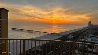 *GOLDEN HOUR ELEVATED* From the 20th floor of Calypso Tower III, sweeping Gulf views and spectacular sunsets take center stage, with a front-row vantage point overlooking the Pier Park pier and seasonal fireworks lighting up the coastline. Step onto the oversized private balcony and you may quickly decide this is your favorite seat in Panama City Beach.

Located in one of PCB's most sought-after resort destinations, this beautifully appointed condo combines an exceptional beach lifestyle with strong short-term rental appeal. Just a five-minute walk from Pier Park and approximately 400 feet from deeded beach access, owners and guests can enjoy the Gulf, dining, shopping and entertainment without ever needing to get in the car.

Designed to comfortably accommodate six, the spacious floor plan includes a private king primary suite, custom-built hall bunks and a sleeper sofa, along with two full bathrooms, a feature that makes a noticeable difference when hosting family, friends or vacation guests.

Inside, thoughtful upgrades set this residence apart from the typical rental condo. Quartz countertops in the kitchen and baths, custom lighting, custom window treatments and wainscoting throughout create a polished coastal feel, while the open-concept kitchen with GE stainless steel appliances keeps the space comfortable and functional for everything from a quick beach-day breakfast to dinner after sunset.

Offered fully furnished and turnkey, the condo is ready to enjoy personally or place into a rental program with no additional setup required. Completed in 2020, Tower III also offers the benefit of newer construction and modern systems compared with many established beachfront properties in the area.

Calypso Tower III delivers the resort experience buyers and vacationers are looking for, including a seasonally heated zero-entry pool, hot tub, fitness center, fire pit, tiki bars, rentable cabanas and on-site dining. And with Pier Park just steps away, Topgolf, the SkyWheel, movie theater, restaurants, shopping and family entertainment are all within easy reach.

Whether you are looking for a Gulf Coast getaway, an income-producing vacation property, or a little of both, this 20th-floor residence delivers a combination that is increasingly hard to duplicate, unforgettable views, a premier location and the ability to walk from your door to some of the best of Panama City Beach.

Coastal living meets sky-high serenity, where every sunset feels like your own private show.