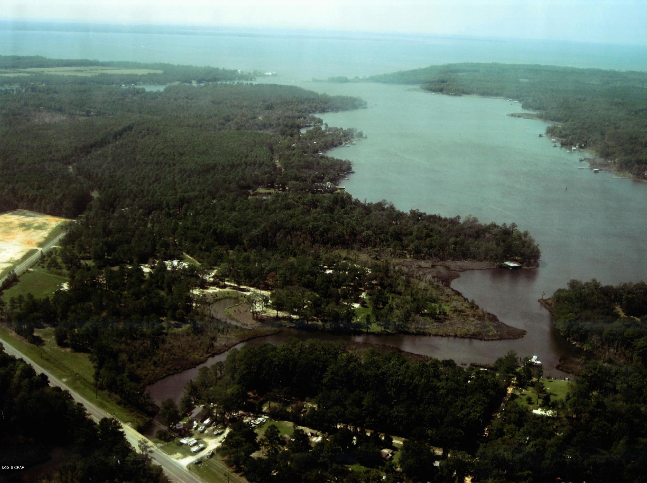 This 34 +/- acre development is located approximately 1.7 miles south of State Hwy 20 on US Hwy 331 South and approximately 3 miles north of the Choctawhatchee Bay from the Clyde B. Wells Bridge. Property currently has plans for development as RV Park with Marina, restaurant and commercial outparcels etc.  Agent has engineerring and construction plans available with signed NDA.  Potential opportunity for commercial and recreational development with access to the Choctawhatchee Bay along a growing corridor of Walton County with average AADT between 17-18K cars per day. This development consists of 10 parcels. perfectly situated in a HIGH TRAFFIC corridor with potential for marina, recreational use, commercial, etc.