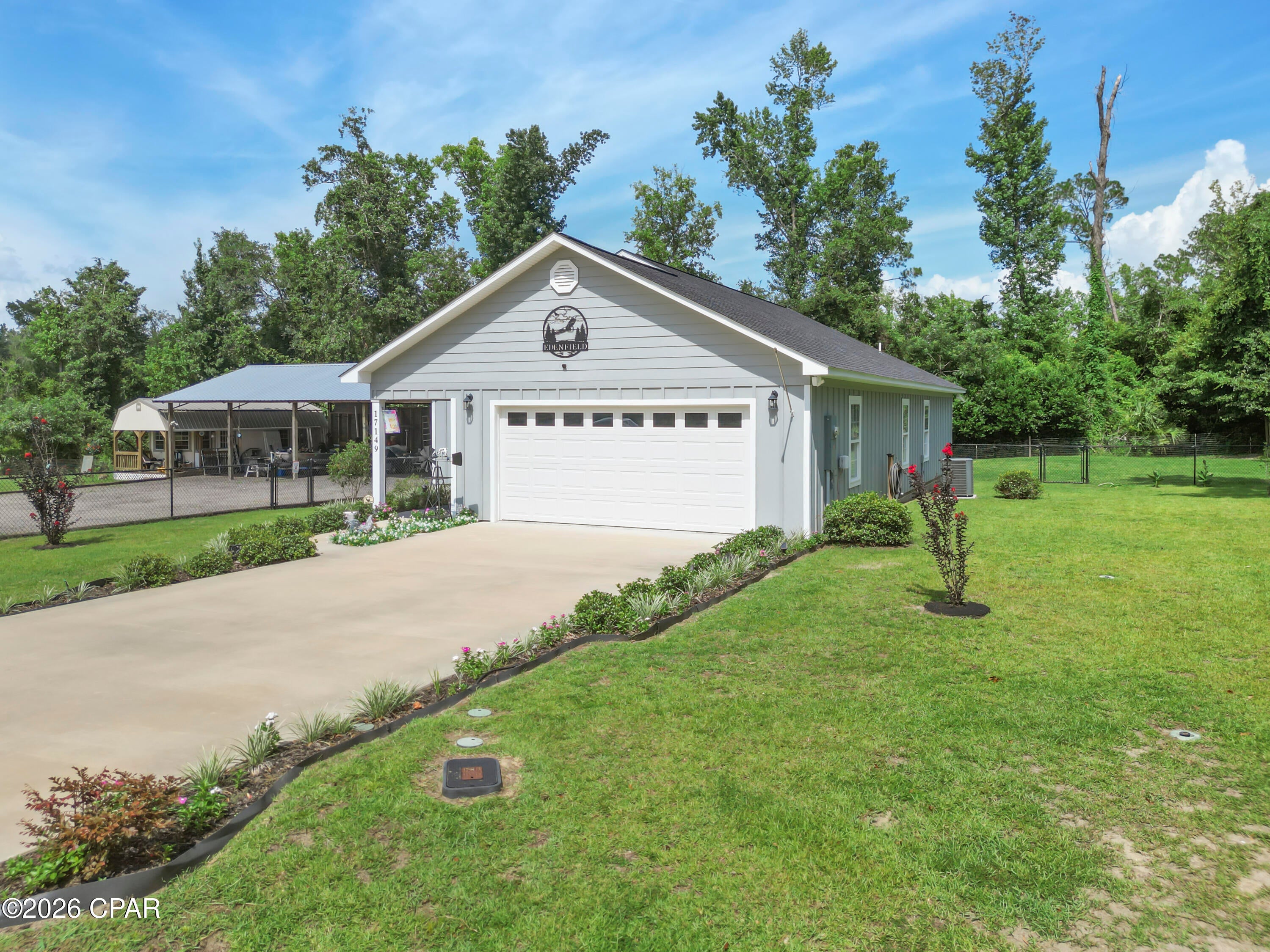 CURRENTLY UNDER CONTRACT, SELLER WILL CONSIDER BACKUP OFFERS

Welcome to 17149 NW 16th Street in Blountstown, Florida! Built in 2022, this well kept home sits on one acre and offers modern comfort with plenty of useful outdoor space. The open living and dining areas make it easy to relax, entertain, and spend time together. The kitchen features white cabinets, stainless steel appliances, a breakfast bar, and a tiled backsplash. Vaulted ceilings add to the bright, open feel.

Several updates were completed in 2024, including new toilets, a tiled shower in the primary bathroom, and a new tub with tiled walls in the guest bathroom. The owners also upgraded the plumbing fixtures, door knobs and hinges, front door, dining room chandelier, and bathroom vanity lights. In 2026, the primary bedroom closet was improved with custom wood shelving.

Outside, the large fenced backyard provides room for pets, gardening, outdoor activities, and more. A double drive-through gate with an electric opener makes access easy. The large pole barn provides covered space for vehicles, boats, trailers, equipment, storage, or hobbies.

Located approximately one hour from Panama City and about one hour and 20 minutes from Dothan, Alabama, this property offers a balance of country living and access to shopping, dining, healthcare, and employment opportunities. Set up your showing soon and come see everything this property has to offer!