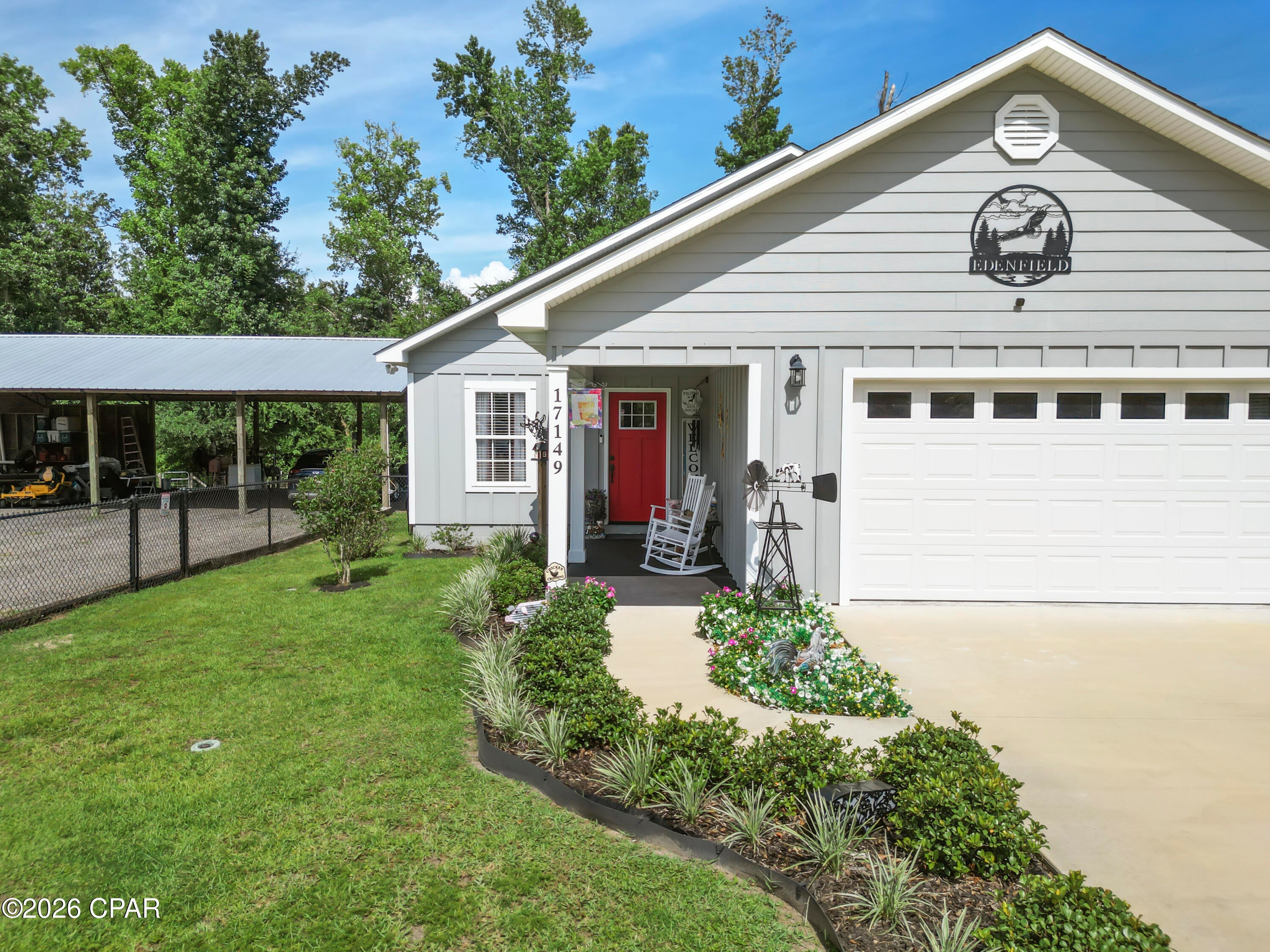 Welcome to 17149 NW 16th Street in Blountstown, Florida! Built in 2022, this well kept home sits on one acre and offers modern comfort with plenty of useful outdoor space. The open living and dining areas make it easy to relax, entertain, and spend time together. The kitchen features white cabinets, stainless steel appliances, a breakfast bar, and a tiled backsplash. Vaulted ceilings add to the bright, open feel.

Several updates were completed in 2024, including new toilets, a tiled shower in the primary bathroom, and a new tub with tiled walls in the guest bathroom. The owners also upgraded the plumbing fixtures, door knobs and hinges, front door, dining room chandelier, and bathroom vanity lights. In 2026, the primary bedroom closet was improved with custom wood shelving.

Outside, the large fenced backyard provides room for pets, gardening, outdoor activities, and more. A double drive-through gate with an electric opener makes access easy. The large pole barn provides covered space for vehicles, boats, trailers, equipment, storage, or hobbies.

Located approximately one hour from Panama City and about one hour and 20 minutes from Dothan, Alabama, this property offers a balance of country living and access to shopping, dining, healthcare, and employment opportunities. Set up your showing soon and come see everything this property has to offer!