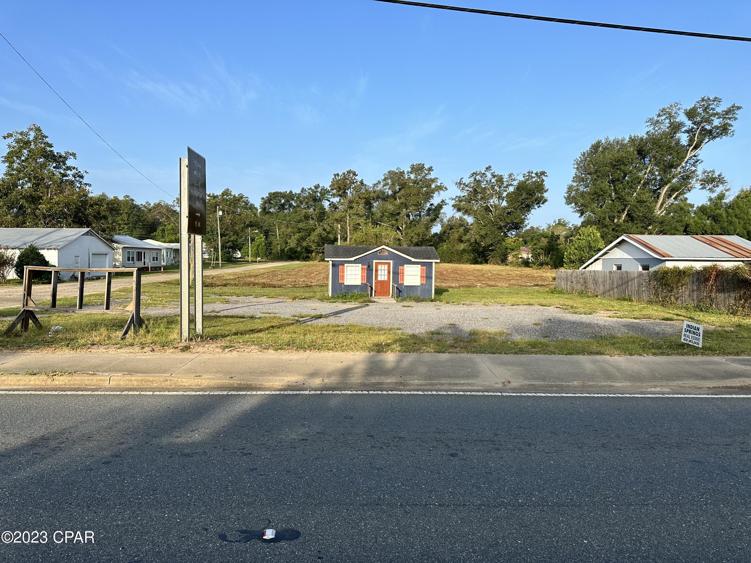 Vacant land on Hwy 231 which includes almost the Whole block.  There a 10 x 20 Building facing Hwy 231. There is power to the building and a/c.
Depending on your needs, you have several options on this property.