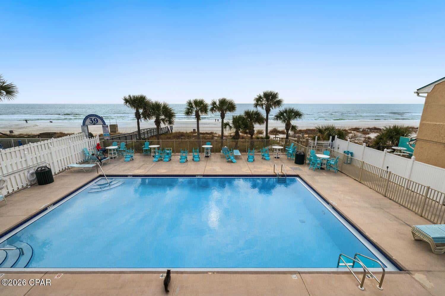 This 2 BR unit is perfectly located, you have a POOL & TENNIS COURTS & OVERFLOW PARKING right out back and you can easily WALK to the BEACH, MINI GOLF, PICKLEBALL... BUT if you don't want to walk NO PROBLEM, you can get a GOLF CART and keep it at YOUR UNIT. This unit has 2 PRIVATE PARKING SPOTS plus A GOLF CART PARKING SPOT!!! You will love the convenience of this END UNIT.

Roof '2016 ~ A/C '2023 ~ Ranai Tankless Water Heater '2017 ~ Interior Freshly Painted GRAY ~ New Interior Doors ~ Exterior Front & Back Patios painted with Granite Grip.

Gulf Highlands Beach Resort is a GATED RESORT in the HEART of PCB and is in Walking Distance to several Attractions, Dining, Shopping, Post Office, and Walmart.  HOA fees are $1121.78/Qtr and include Household Trash Disposal, Internet, Lawn Mowing, Sprinklers, Termite Contract with HOA, Some Pest Control, and the Amenities... 11 Pools ''5 Heated'', 3 Tennis Courts ''2 Lighted'', 4 Pickleball Courts, Fitness Center, 18 Hole Mini Golf, Playground, Shuffleboard Courts, Conference Center, and a Private Beach House with a Snack Bar on The Beach along with 1 of the 11 Pools. 

Age, SF, and Dimensions are approximate... please verify if Important.
