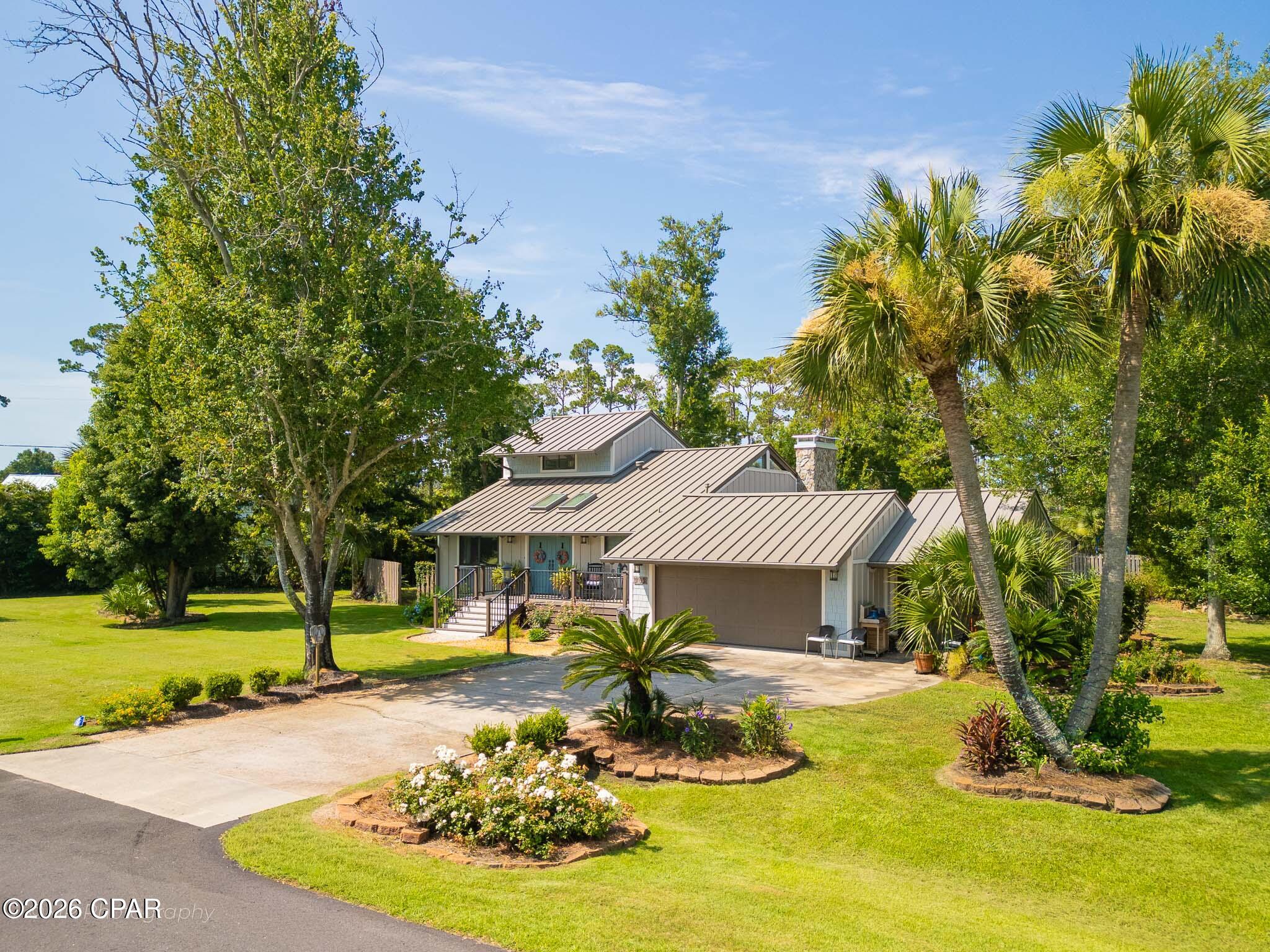 CURRENTLY UNDER CONTRACT, SELLER WILL CONSIDER BACKUP OFFERS
There's something about DuPont Drive. It's one of those quiet, classy streets in Port St. Joe where people tend to stay put once they find a home here -- and 302 DuPont is a great example of why.
The inside has been thoughtfully remodeled and it shows -- clean, updated, and genuinely move-in ready. Outside, mature trees and well-established landscaping give the yard a settled, lived-in beauty you can't fake with new plantings. There's covered and open outdoor space to stretch out on, whether that's morning coffee or an evening with friends.
Three bedrooms, two bathrooms, and a location that's hard to beat: walk to St. Joe Bay, hop over to downtown for dinner or shopping in minutes, and stay close to local schools. This is Port St. Joe living at its most comfortable.