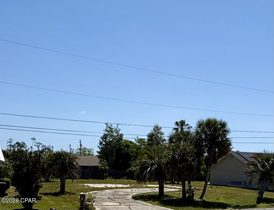 Build your dream home with ease on this ready-to-go residential lot! Previously home to a residence, this property has already been cleared--saving you time and money--while still offering valuable existing improvements. Underground utilities remain in place, making your new construction process even more convenient and cost-effective.

The existing driveway is intact, and mature palm trees add a touch of character and charm to the property. The lot is partially fenced, providing a head start on privacy and boundary definition.

Ideally located just a short distance from beautiful East Bay, you'll enjoy the perfect balance of peaceful surroundings and easy access to water, recreation, shopping, and dining.

Opportunities like this don't come around often--bring your builder and start planning your new home today!