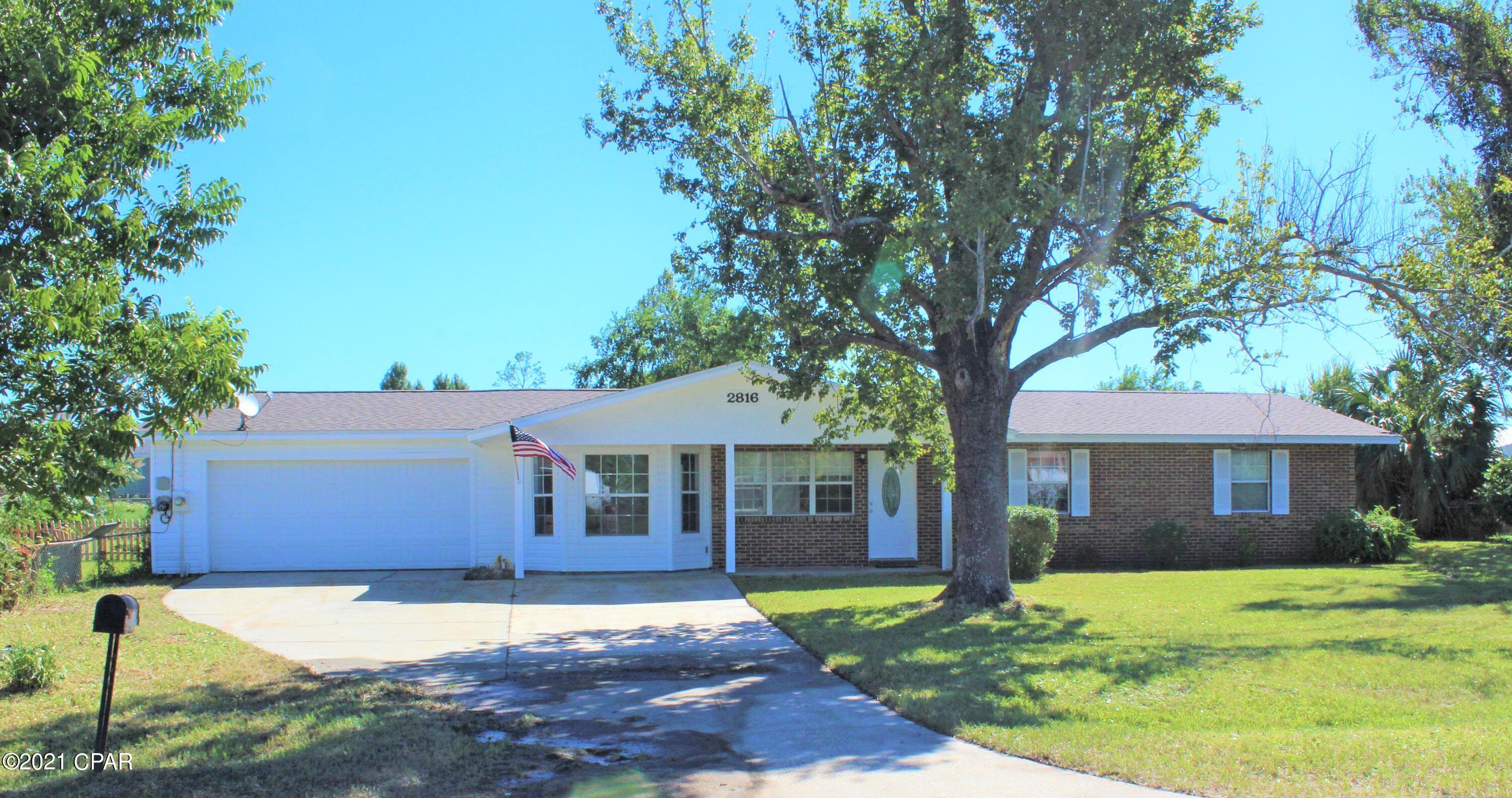 Incredibly spacious 3 bedrooms, 2 bath home situated on a large .31 acre lot that is close to Tyndall AFB, Eastern Ship Building, the Port, and both medicals facilities. Home offers a kitchen with lots of counter space and cabinets, Living room, Dining/Family room, Bonus room, spacious laundry room. Three bedrooms, two baths. The home has tile in the kitchen, dining/family, and down the hallway. New carpet in bedrooms, living room, and bonus room. New interior and exterior paint. New led light fixtures, some new plumbing fixtures. The garage is oversized with a workbench, and garaged door opener, The back yard is fenced and has a mature citrus tree with fruit. Call today for your private showing.