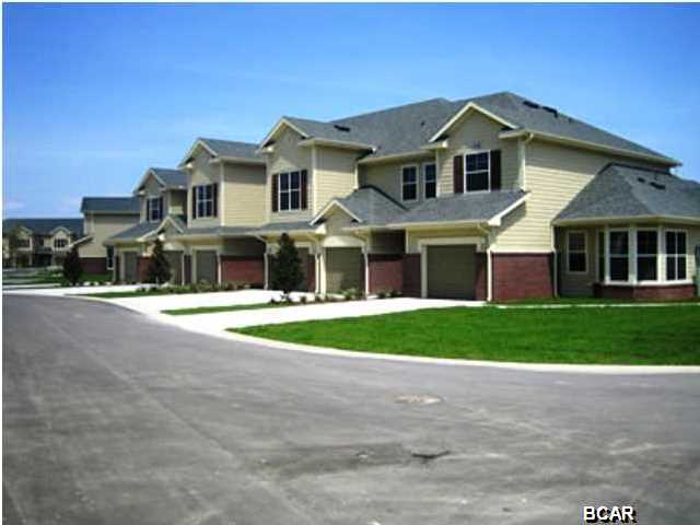 UNIT with great privacy and large yard. Very nice 3 bedroom unit in popular Baldwin Rowe. The neighborhood is completely fenced and gated. The interior offers hardwood floors, granite tile counters plus crown molding. the living area is very large and opens to a screened porch in the back. The community offers a clubhouse and swimming pool too.