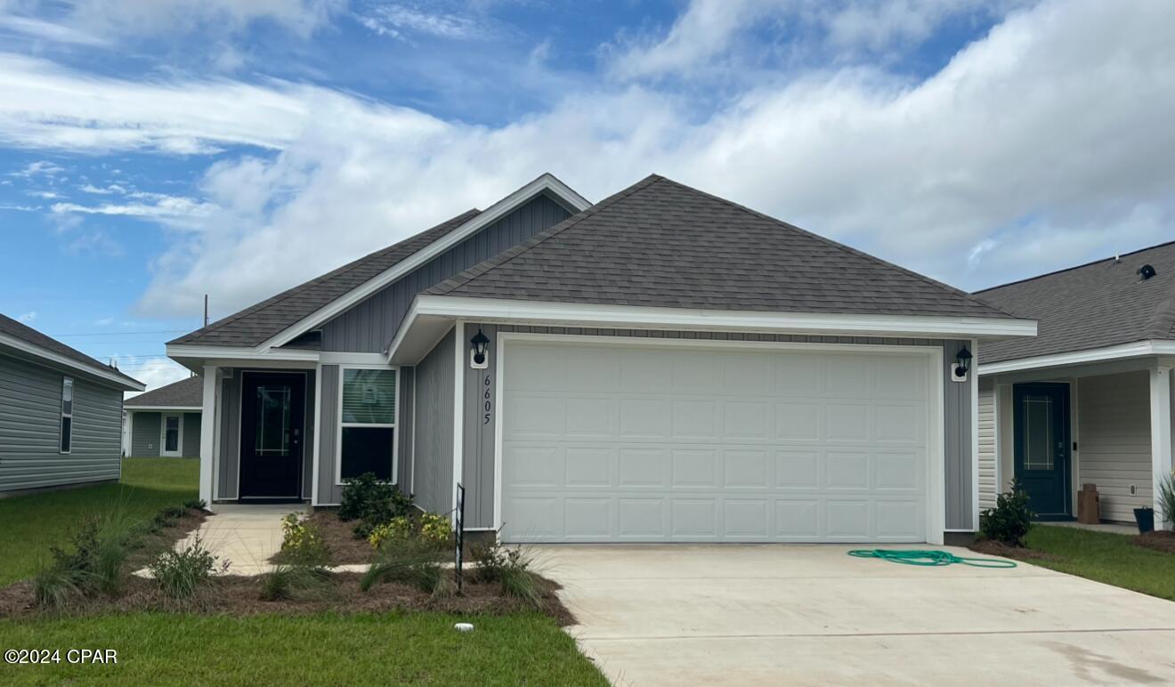 New home under construction in Liberty located in Panama City. This Celeste floor plan is located at 6605 Canley Court. As you enter this home you will notice the bright entry way afforded by the prairie door.  This 3-bedroom 2-bathroom, 1403 square foot home is an open concept floorplan.  The primary bedroom and bathroom are located off the entry at the front of the home.  The primary bathroom has double sink vanity, large shower, and a huge closet.  Proceed down the entry hallway passing the laundry area as you enter into the kitchen, dining, and family area.  The kitchen offers a breakfast bar with space for seating.  On the opposite side of the home from the primary bedroom upfront, there are two spacious secondary bedrooms separated by a shared bathroom.  This home includes standard appliance package that includes a smooth top range, dishwasher and microwave as well as design features; EVP flooring, granite countertops and bright white cabinetry.  Liberty neighborhood is conveniently located in beautiful Panama City off Star Avenue near 231. Located just 25 minutes from Tyndall Airforce Base, 20 minutes to hospitals, and less than 15 minutes to shopping, restaurants, and grocery stores you will be amazed at the convenience once you enter the winding entrance to this beautiful sanctuary. Liberty, D.R. Horton's premier new lifestyle community, offers a 7,500 square foot community center with full gym, wellness rooms and much more. Additionally, behind the community center is a water wonderland with resort style pool, splash pads, and an outdoor grilling kitchen with seating.