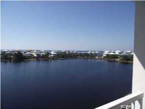 A GREAT INVESTMENT OR YOUR PERECT BEACH GETAWAY! NICELY FURNISHED 1 BEDROOM 1 BATH 5TH FLOOR UNITY HAS EVERYTHING YOU NEED. ENJOY THE INCREDIBLE LAKE AND GULF VIEWS DURING YOUR STAY AT THE BEACH. FULLY APPOINTED KITCHEN WITH STAINLESS STEEL APPLIANCES, GRANITE COUNTERTOPS, LAMINATE FLOORS THROUGHOUT WITH TILE IN THE KITCHEN AND BATHROOM. ENJOY A GLASS OF WINE WHILE YOU ENJOY THE SUNSETS OVER LAKE CARILLON. LOCATED AT THE WEST END OF PANAMA CITY BEACH, JUST EAST OF THE WALTON COUNTY LINE, NESTLED ALONG THE SHORES OF LAKE CARILLON WITH ACCESS TO 3900' OF PRISTINE WHITE SANDY BEACHES. THE COMMUNITY OF CARILLON BEACH FEATURES 7 BEACH WALKOVERS, 4 POOLS (ONE OF WHICH IS GULF FRONT), TENNIS COURTS, PARKS & WALKING PATHS, FITNESS CENTER & SPA, SHOPS, AND RESTAURANTS. CONVENIENT TO