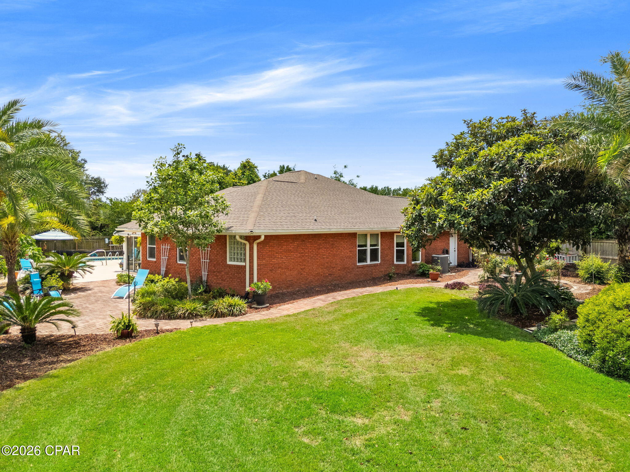 Assumable VA Loan!! 5.25% (VA ONLY)

Welcome to this beautifully maintained all-brick home tucked away at the end of a quiet cul-de-sac in the desirable Northshore subdivision. Offering 3 bedrooms, 2 bathrooms, and a rare three-car garage, this property combines comfort, space, and functionality in a peaceful neighborhood setting.

Situated on a spacious, well-manicured lot, the home is surrounded by lush landscaping and fruit trees, creating a private backyard retreat. Inside, you'll find an abundance of natural light, high ceilings, and an open-concept layout designed for both everyday living and entertaining. The kitchen features stainless steel appliances and flows seamlessly into the main living areas, while a second living space provides flexibility for family gatherings, holidays, or a cozy retreat.

One of the standout features is the heated and cooled sunroom--perfect for enjoying your morning coffee or relaxing year-round while overlooking the backyard oasis. Step outside to your private pool, ideal for soaking up the Florida sunshine and entertaining guests.

Additional highlights include an oversized driveway with plenty of room for boats or RVs, no HOA, and a location in Flood Zone X for added peace of mind. Major updates have already been taken care of, including a new roof in 2020, pool resurfaced in 2017, and updated windows installed in 2017.

This home offers the perfect blend of indoor comfort and outdoor living--ideal as a primary residence or a place to gather and make lasting memories.
A newer riding lawnmower will convey with a full price offer. 

All measurements and items of importance to be confirmed by buyer or buyer agent.