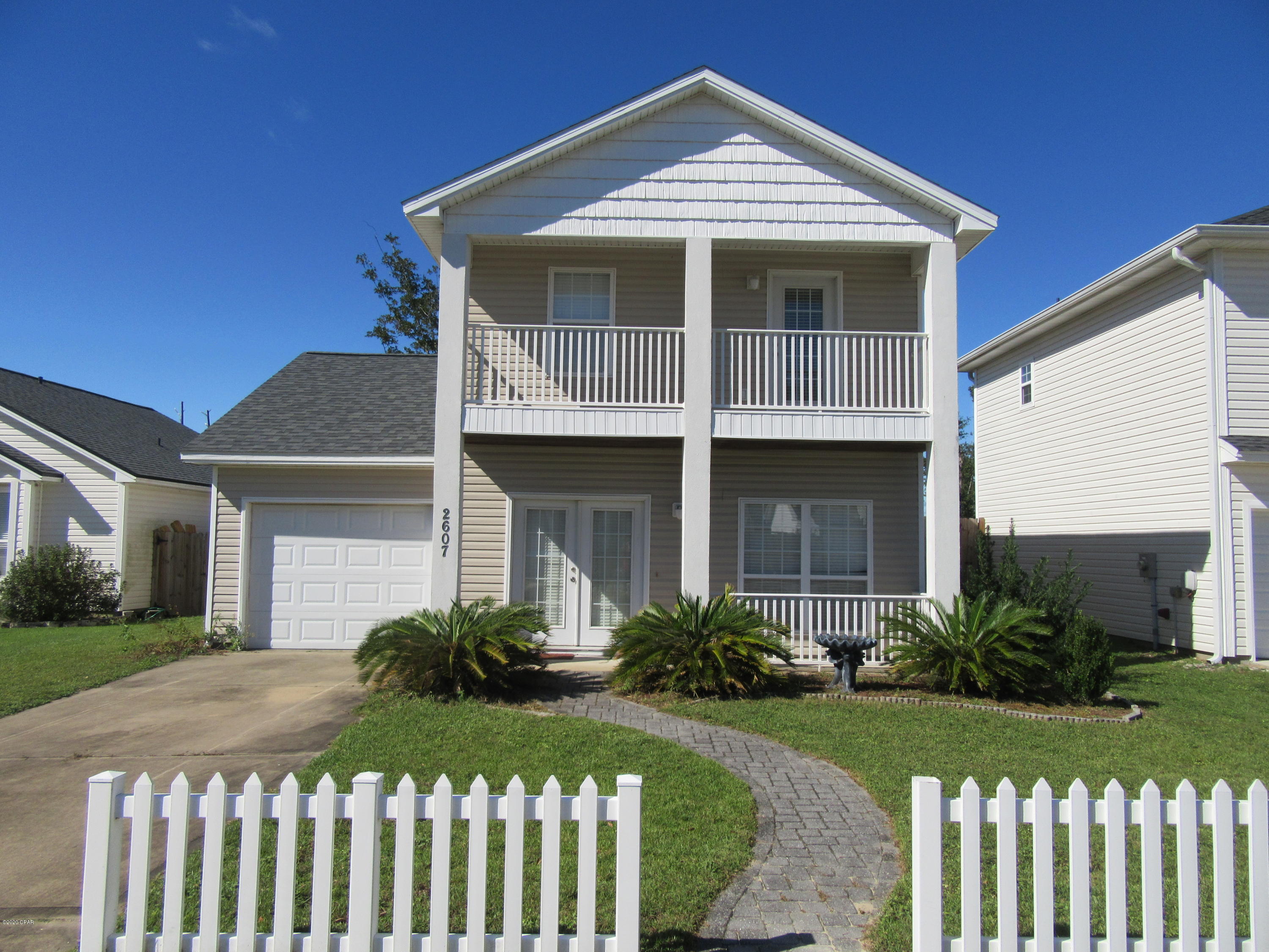 Spacious 3 bedroom 2.5 bath two story home on a Cul-de-Sac. This home offers a garage, large living & dining area, walk-in closet, inside laundry room, attic space, and covered balcony off second story master. Pest control (once per year termite bond) included. All sizes are approximate, please measure and verify if important. School assignments are subject to change, please check with Bay County for most accurate information. Pets under 30 lb allowed with owner approval and NON REFUNDABLE pet fee of $250.00 per pet. Breed restrictions apply
