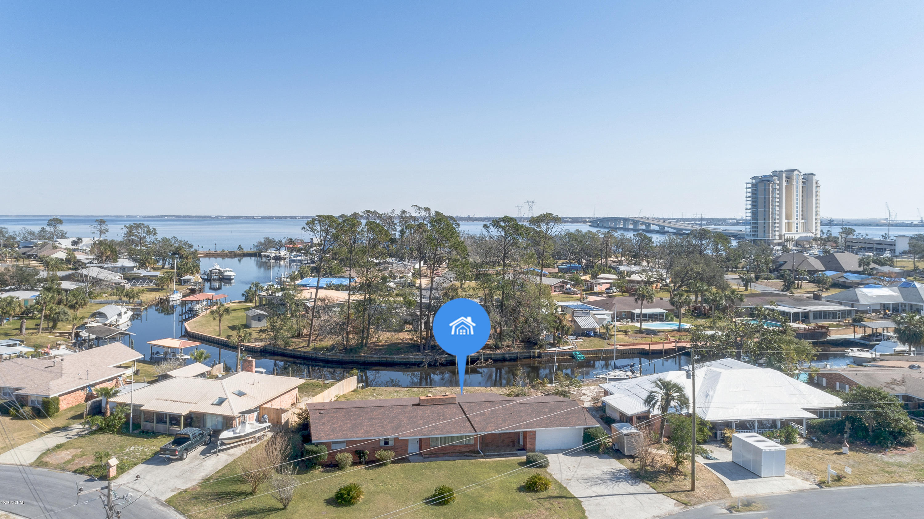 Currently Under Contract, seller accepting back up offers! Perfect opportunity to own a home on the Deep water Canal! Park your boat right at your back door ! This move in ready brick home on over sized corner lot futures 2017 roof  ,solid surface counter tops, double fireplace, new water heater,large Florida room . Enjoy the view and dolphins from you living room ! 

Age, SF, and dimensions approximate.