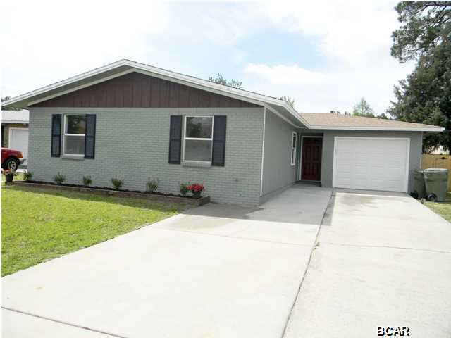 Attractive Home in Quaint Lynn Haven Community - INGROUND POOL!! The interior of this home features 3 bedrooms, 2 full bathrooms, 1,600+ square feet, an open floor plan, a large 18x14 living room, a brand new kitchen with dining area, a spacious sunroom and a one car garage. The kitchen boasts new stainless steel appliances, beautiful granite counter tops, an island with breakfast bar, self retracting drawers, ample counter and cabinet space, wood laminate floors and a pantry. The 17x11 sunroom has ample light and overlooks the in-ground pool. The large 15x12 master bedroom can accommodate your king size bed and has an adjoining master bathroom. The other two bedrooms are of good size. The exterior features an in-ground pool with new tile, a newly fenced-in backyard, a large