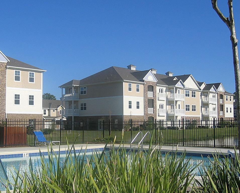 Villas At Suncrest - This is a 2 bedroom, 2 bath flat located in the heart of Panama City Beach. Just minutes form the Navy Base and a short drive to Pier Park. The Villas at Suncrest is a gated community featuring a community pool, club house, gated entrance. Units all include all utilities except electricity - water, sewer, trash, basic cable, internet and local phone service. Units also feature spacious floor plans with granite counter tops, split bedroom plans, and washer and dryer hook ups.