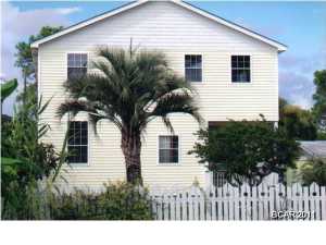 Here is your chance to own a waterfront home on Grand Lagoon! You will enjoy beautiful lagoon views from your first and second floor balcony. Just minutes to the Gulf of Mexico, Shell Island, and Restaurants that cater to boat traffic. There is a dock, and a wet slip already in place. Large Lagoon lot, 194 ft deep with great elevation. Survey available. The home was built with a Mother In Laws Quarters in mind, the 2nd Floor features two bedrooms two baths and a bright open kitchen w/oak cabinets, breakfast bar and ceramic tile. First floor has ten foot ceilings, 2 bedrooms and 2 bathrooms and is already wired and ready for a 2nd kitchen . Home has many possibilities and can be enjoyed as a large home or a home w/ a mother-in laws quarters. Two a/c units and Two laundry rooms. They