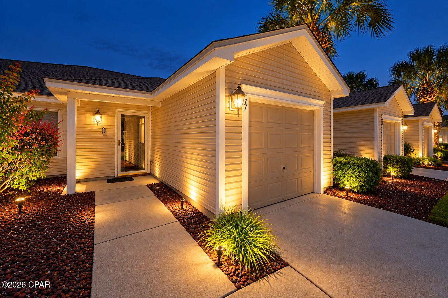 Beautiful Palmetto Trace Subdivision, with its gorgeous tree-lined streets, two community pools and sidewalks throughout, is dog-friendly, golf cart-friendly and sits in the perfect location, minutes to Pier Park's many shops & restaurants, and the world's most beautiful beaches! This 2 bed/2 bath townhome is extremely clean, and move-in ready. Inside you will find an open floor plan all on one level with a huge amount of living space to include oversized living & dining areas with vaulted ceiling, open kitchen w/breakfast area and breakfast bar, large master bedroom with 2 large closets, laundry closet with stacked washer/dryer, and ample storage space. Additional highlights include a one car garage, private screened-in porch, unique extended patio and garden area with views of trees, lake, and the adorable ducks that occupy it. Updates include roof 2023, HVAC 2021, water heater 2022, and new garage door opening system with remote 2025. Home also includes metal hurricane shutters with all the hardware. It's rare to find an established neighborhood with low HOA fees. $173/mo covers lawn and landscaping maintenance, palm tree trimming, trash service, pools, and an exterior pressure wash 1x/yr, so be sure to compare! 

Palmetto Trace is 14 miles from PCB International Airport, 5 minutes to shopping, restaurants & entertainment at Pier Park, and just over a mile to Gayle's Trails walking trails, Frank Brown park and PCB's 3,000 acre conservation park. From Palmetto Trace, street legal vehicles are allowed to cross Hwy 98 traveling North & South on Pier Park Drive. Call to schedule your private showing. All information is approximate & should be verified by buyer if important.