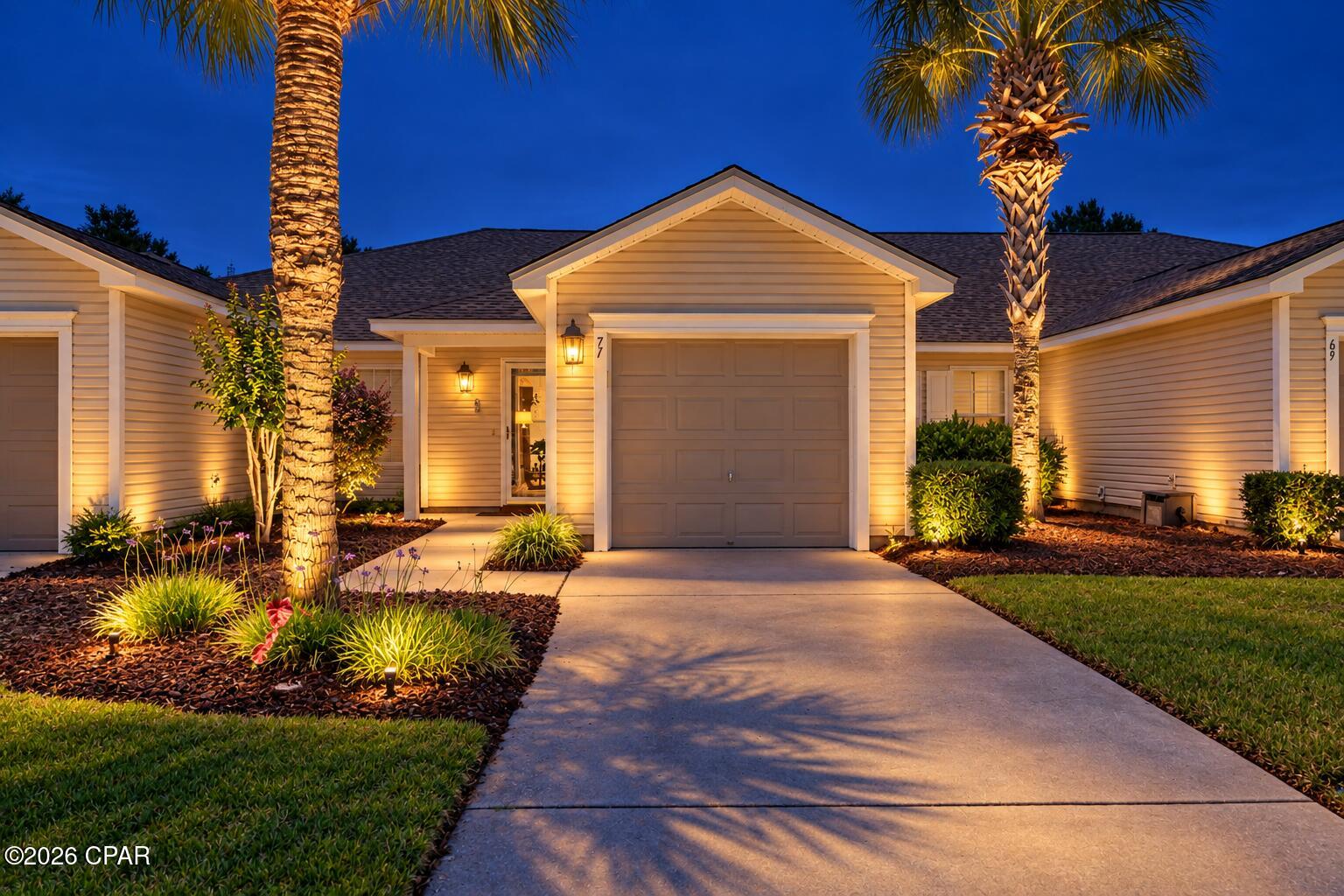 Beautiful Palmetto Trace Subdivision, with its gorgeous tree-lined streets, two community pools and sidewalks throughout, is dog-friendly, golf cart-friendly and sits in the perfect location, minutes to Pier Park's many shops & restaurants, and the world's most beautiful beaches! This 2 bed/2 bath townhome is extremely clean, and move-in ready. Inside you will find an open floor plan all on one level with a huge amount of living space to include oversized living & dining areas with vaulted ceiling, open kitchen w/breakfast area and breakfast bar, large master bedroom with 2 large closets, laundry closet with stacked washer/dryer, and ample storage space. Additional highlights include a one car garage, private screened-in porch, unique extended patio and garden area with views of trees, lake, and the adorable ducks that occupy it. Updates include roof 2023, HVAC 2021, water heater 2022, and new garage door opening system with remote 2025. Home also includes metal hurricane shutters with all the hardware. It's rare to find an established neighborhood with low HOA fees. $173/mo covers lawn and landscaping maintenance, palm tree trimming, trash service, pools, and an exterior pressure wash 1x/yr, so be sure to compare! 

Palmetto Trace is 14 miles from PCB International Airport, 5 minutes to shopping, restaurants & entertainment at Pier Park, and just over a mile to Gayle's Trails walking trails, Frank Brown park and PCB's 3,000 acre conservation park. From Palmetto Trace, street legal vehicles are allowed to cross Hwy 98 traveling North & South on Pier Park Drive. Call to schedule your private showing. All information is approximate & should be verified by buyer if important.