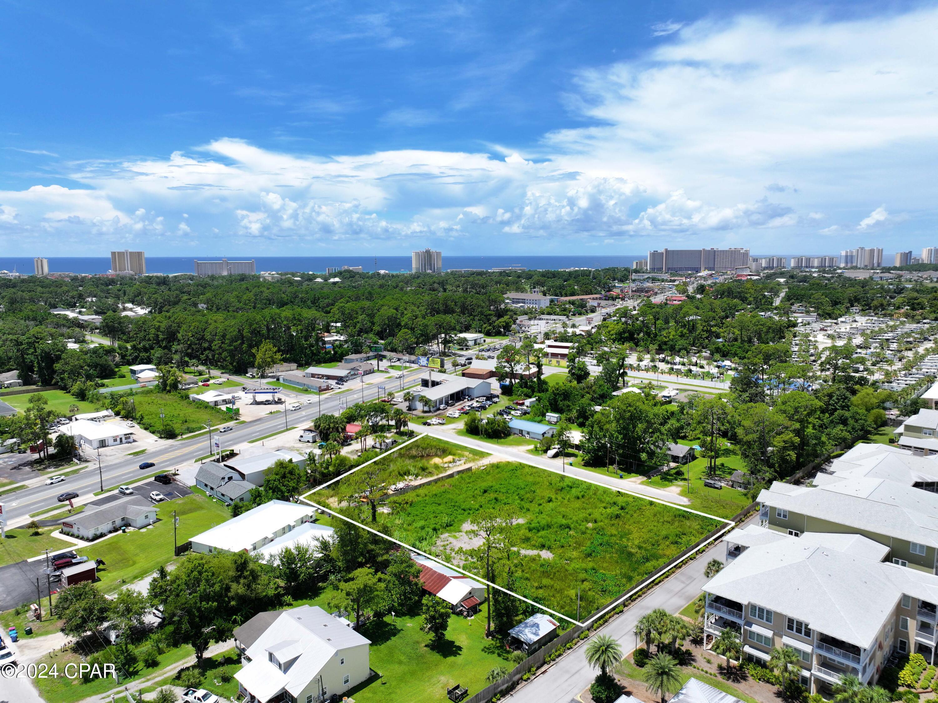 Prime development opportunity located in the heart of Panama City Beach. Four adjoining lots are being offered as a complete package for $700,000. The package includes 1910 Anne Avenue, 1906 Anne Avenue, 1826 Anne Avenue A & 0 Anne Avenue for a total of 1.412 acres, offering generous space for a wide range of projects. Currently zoned for single-family residential use, the property holds tremendous potential for rezoning to support multi-family housing, a residential community, commercial development, or other creative uses. The possibilities are limited only by your vision.