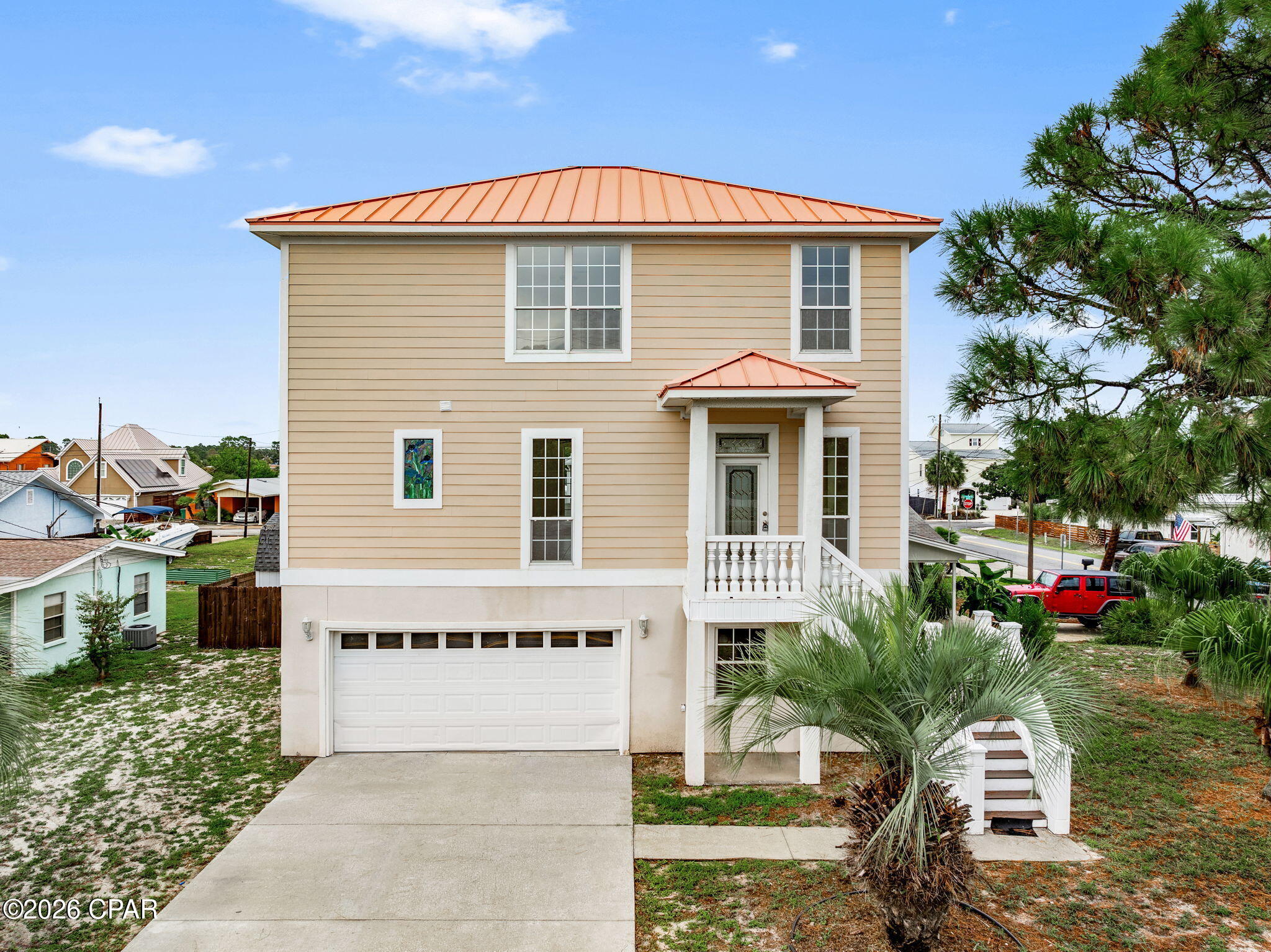 Live the Panama City Beach lifestyle with the beach AND boat access just minutes away! This three-story, 3-bedroom, 2.5-bath home is ideally located off Thomas Drive, with Dolphin Drive boat landing and public beach access both within approximately half a mile making it easy to spend your days boating, fishing, or enjoying the beautiful Gulf waters.
The second floor features a spacious open-concept living, dining, and kitchen area with tile flooring throughout, creating a great space for entertaining and everyday coastal living. French doors open to a covered balcony, giving you additional outdoor living space to enjoy the coastal breeze. A convenient half bath and storage are also located on this level. Upstairs, the third-floor features luxury vinyl plank flooring, three bedrooms and two full baths. Another covered balcony provides even more outdoor space and a great place to relax after a day at the beach. The lower level includes the garage, laundry area, and additional heated and cooled storage space, providing plenty of room for beach gear, fishing equipment, bikes, and more.
With its metal roof, multiple covered balconies, garage, spacious open living area, and exceptional Thomas Drive location, this home offers the flexibility to serve as a primary residence, second home, or coastal getaway. Enjoy convenient access to everything Panama City Beach has to offer while keeping both the Gulf and boating access less than half a mile away! Buyer to verify measurements, distances, and any information deemed important.