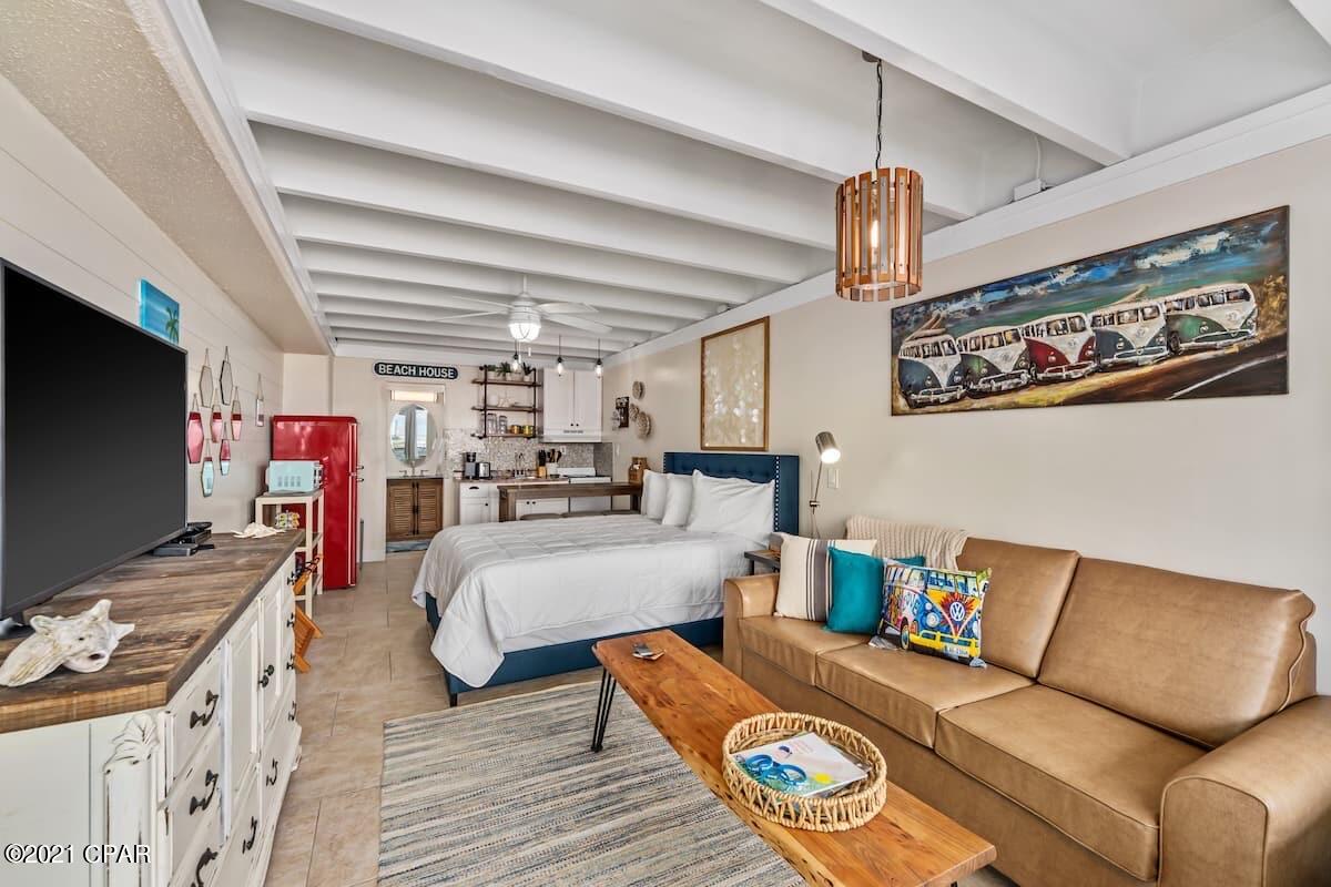 CURRENTLY UNDER CONTRACT, SELLER ACCEPTING BACKUP OFFERS. Nostalgia abounds in this perfectly renovated unit at Fontainebleau Terrace. From the new furniture, new appliances and awesome retro fridge to the adorable VW Bus themed decorations & 1965 ''hippie'' vibe, this unit is turn-key & short term rent ready. Unit 410 is located near the elevators, on the West side of the building with unobstructed Gulf views from the room. There is also stairwell access to the roof top deck on the 5th floor. Super cool views from up here! Fontainebleau Terrace offers covered & uncovered patios, BBQ grills, and a huge Gulf-front swimming pool. Located just SW of Nautilus St, there is direct access to the resort from ECP, Hwy 79 & Back Beach Rd. without an abundance of traffic. Request the video walk-through for details.