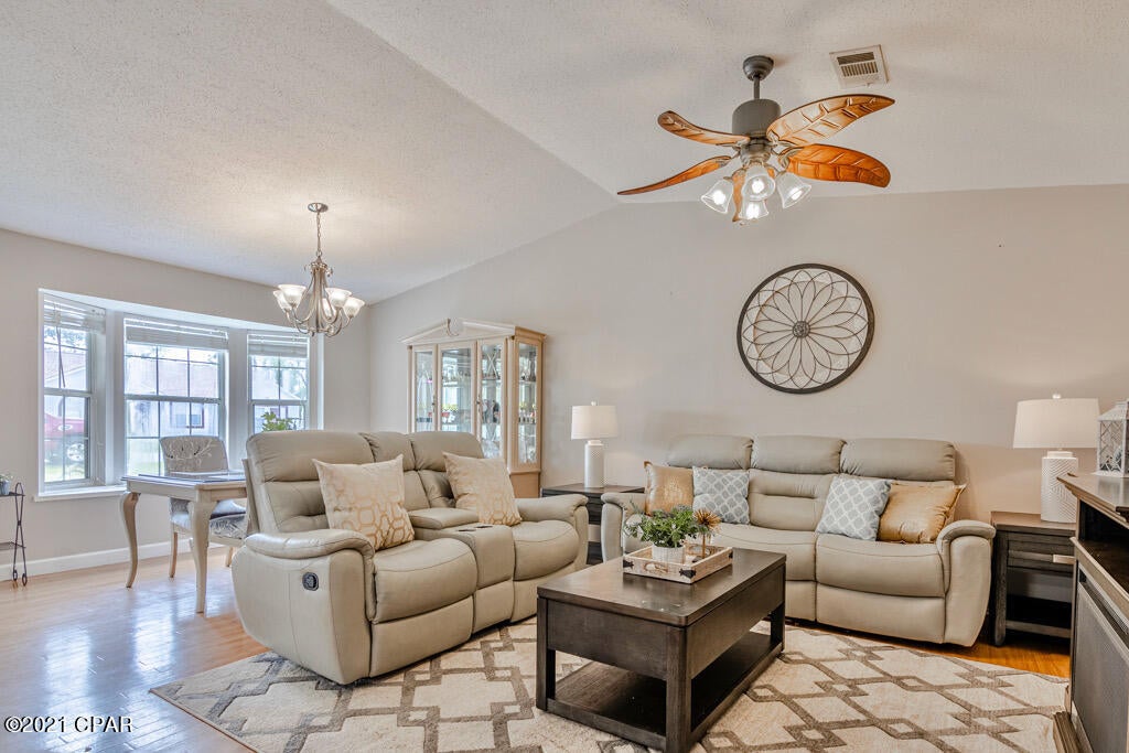 This beautiful home is centrally located just minutes from the beach, schools, parks, shopping, dining, downtown and local colleges! Home has new roof. No HOA. Open concept living, kitchen and dining room with beautiful bay window letting in plenty of light. The laundry room is conveniently right off the kitchen leading to the screened in porch. Backyard is fully fenced in perfect for kids, pets and/or entertaining!