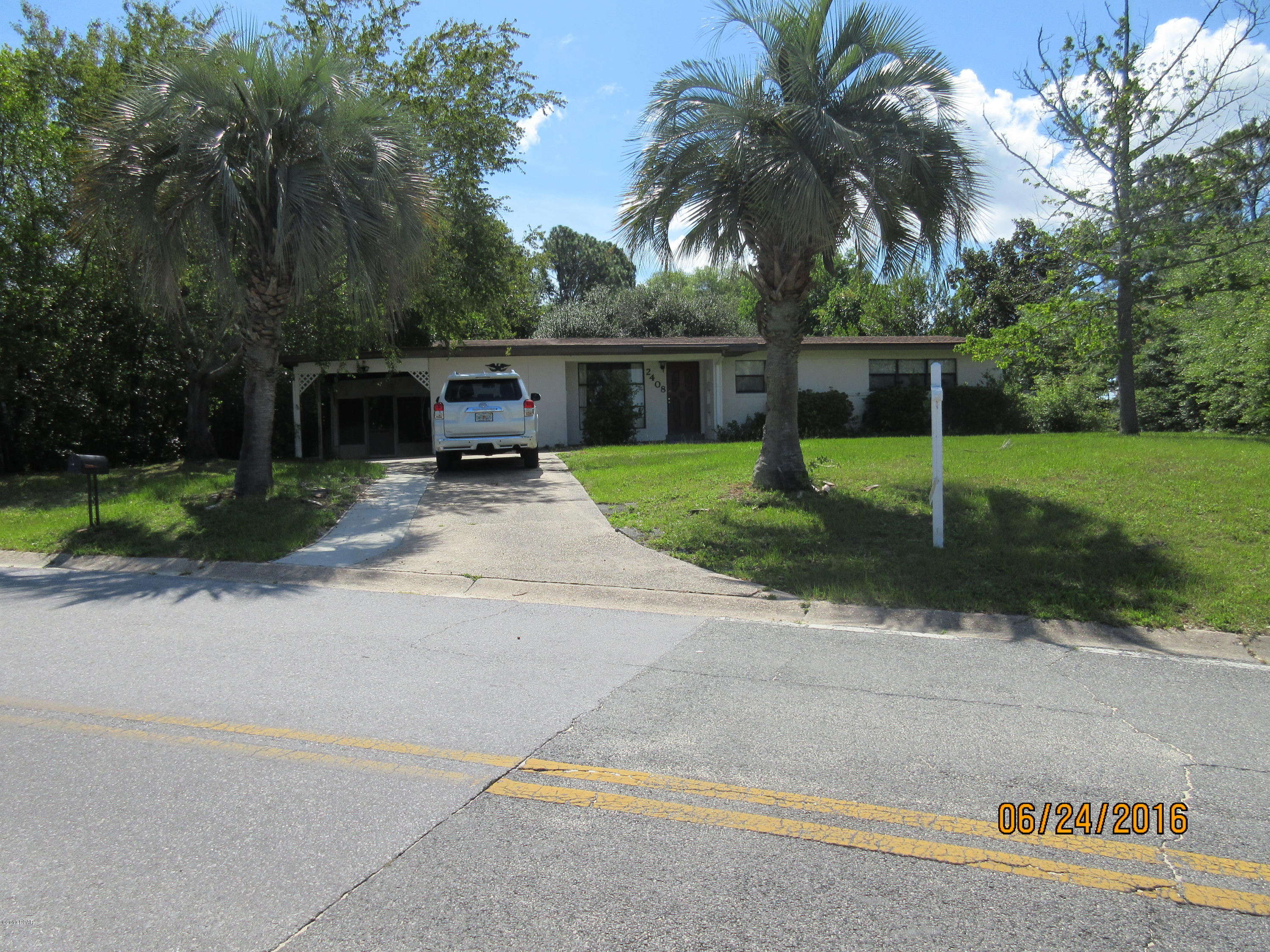 This home is in a great location and sits on a corner lot.  Features tile flooring with carpet in bedrooms, laundry room with washer & dryer, den, large screened porch, carport, dishwasher, stove/oven, central heat & air, city water/septic system and pets are welcome.  Available Feb 1st/view by appointment prior to that.