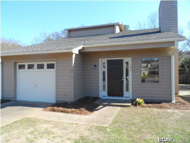 OPEN HOUSE SUNDAY FEBRUARY 15th, 2 to 4:00 PM. MOVE IN READY HOME that has had a COMPLETE RENOVATION inside and out. Enjoy the ''LIKE NEW'' look of this Contemporary home that lives much larger than the square footage implies. On the inside, soaring high ceilings and hand scraped, dark wood laminate flooring are highlighted by loads of natural light and warm neutral colors. A wood burning fireplace and eye catching fixtures add character to the GREAT ROOM. The kitchen features professionally refinished hardwood cabinetry, new stainless appliances and stylish counter tops. The dining area is connected by a spacious bar and is complimented by the same flooring through out. The Master allows room for all your furniture and has a sliding door that opens to a patio. The Master Bath has