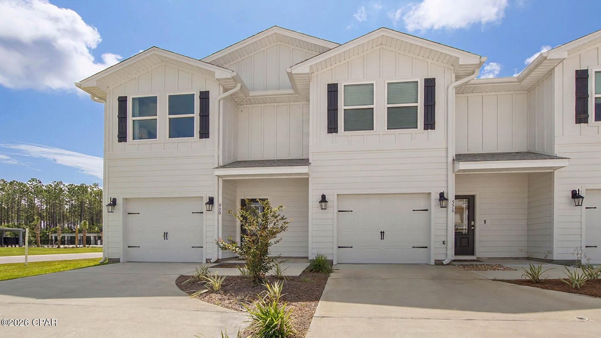Welcome to 580 Melrose Way, a new townhome in Bayside at Ward Creek in Panama City Beach, Florida. This is an end unit townhome is our current model home that has been released for sale. This townhome is being sold unfurnished. All furnishings and window treatments will be removed prior to closing. 

The bright entry leads to an open kitchen, living, and dining area that is designed for comfort and everyday living. The kitchen serves as the culinary center with a spacious center island, beautiful white cabinetry, granite countertops, and a premium stainless steel appliance package including a smooth top stove, microwave and dishwasher. Beautiful windows surround the living area allowing for natural light. 

The first floor is the heart of the home, while the privacy of the second level has all bedrooms, ensuring a quiet retreat. The main suite features a generous closet, an oversized shower, dual sink vanity, and a linen storage area in the private bath. Two additional bedrooms share a hall bath with shower tub combo that create a comfortable space for family or guests.   

The interior features include EVP flooring throughout the main level and second level bathrooms and plush carpet on the stairs, upstairs hallway and bedrooms. All appliances that are currently in the model are included and the warranty will be for the time remaining on the item.