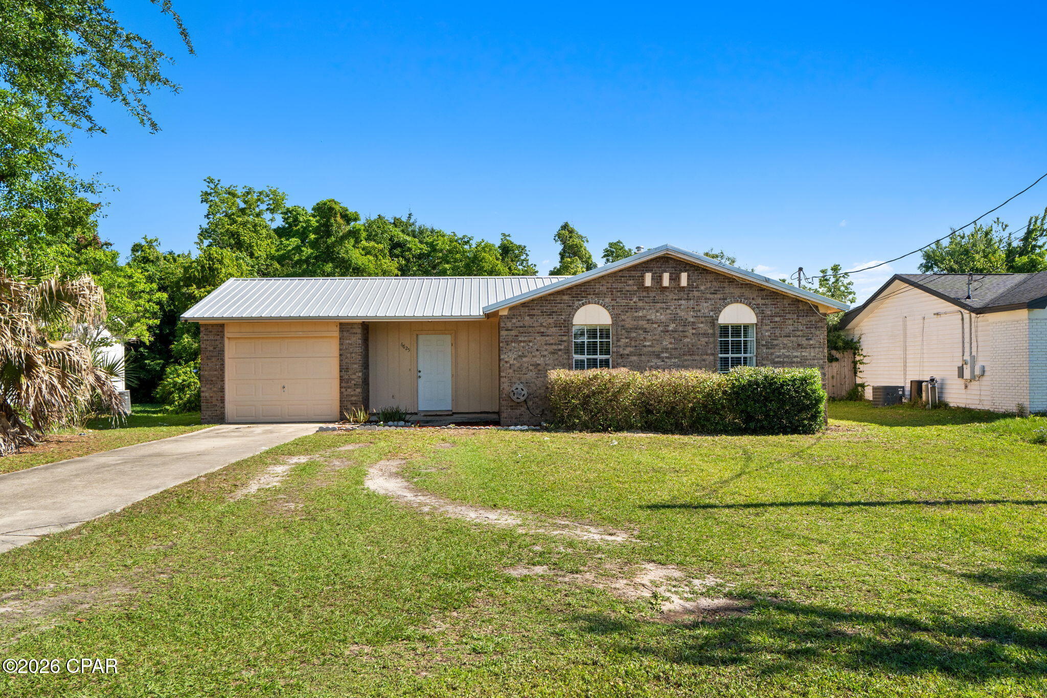 *BACK ON MARKET* No fault to Sellers. 
Welcome home to this affordable and well-maintained 3 bedroom, 2 bathroom home offering comfort, functionality, and convenience all in one package. Whether you're a first-time homebuyer, military family, or investor, this property checks all the boxes with a fully fenced backyard, spacious layout, and a massive 20x20 workshop shed perfect for storage, hobbies, or your next project.

This property also presents an excellent opportunity for someone looking for a starter home to begin building equity while adding their own personal touches over time. With solid features already in place and room to make it your own, this home offers tremendous value at an affordable price point.

Located just a quick 5-minute drive to Tyndall Air Force Base, this home provides an ideal location for easy commuting while still enjoying a quiet residential setting. The backyard offers plenty of room for pets, entertaining, or relaxing evenings outdoors. Opportunities at this price point with added workshop space and a fenced yard do not come around often -- schedule your showing today!