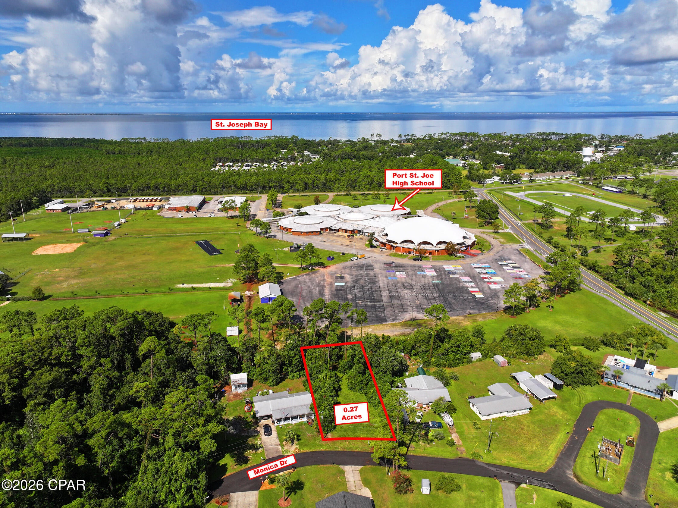 Build your coastal dream in the heart of Port St. Joe! This vacant lot is tucked away in a quiet area of town while still offering convenient access to everything that makes Port St. Joe such a special place to call home. Located close to local schools, downtown shopping, restaurants and entertainment, you'll enjoy the perfect combination of peaceful surroundings and small-town convenience. Hop on your golf cart and head downtown for dinner, shopping, live music or an evening stroll along St. Joseph Bay. End the day watching one of our unforgettable sunsets over the water before making the short ride back home. Whether you're looking to build a primary residence, or your own piece of Florida's Forgotten Coast, this lot offers a wonderful opportunity to enjoy the laid-back coastal lifestyle of Port St. Joe.
