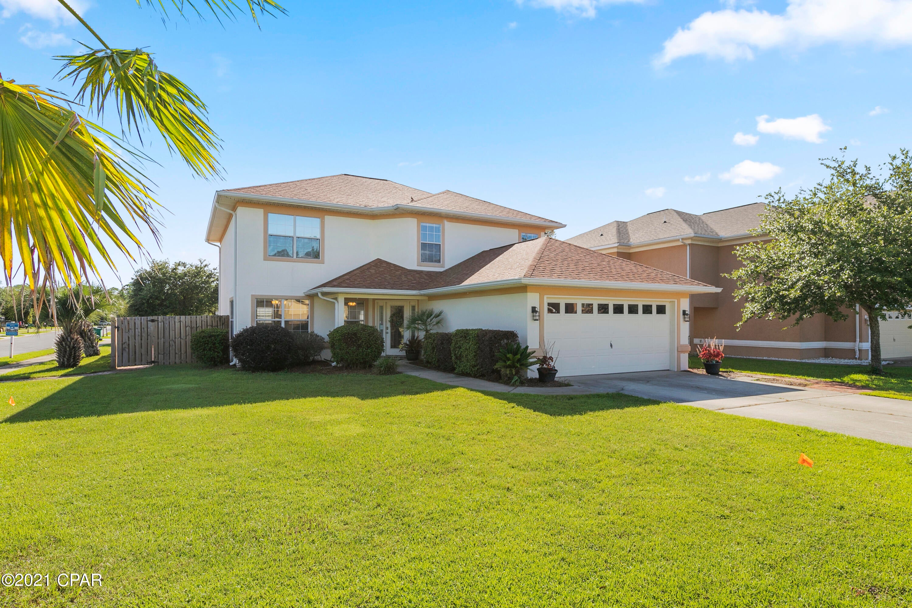 Beautiful 2 story home in the highly sought after community of Driftwood Estates on a corner lot! Only minutes to the beach, shopping, hospital and local attractions, this centrally located property will not last long. Upon entry, you are greeted by the expansive family room which includes a formal dining area surrounded by windows allowing for plenty of natural light. The large kitchen has newer stainless steel appliances and opens up to the living room boasting a fireplace making this space perfect for entertaining plenty of guests. The first floor also features a full sized bedroom and bathroom. Directly off the main living area is large backyard with brick pavers and new privacy fence. The perfect place to call home!