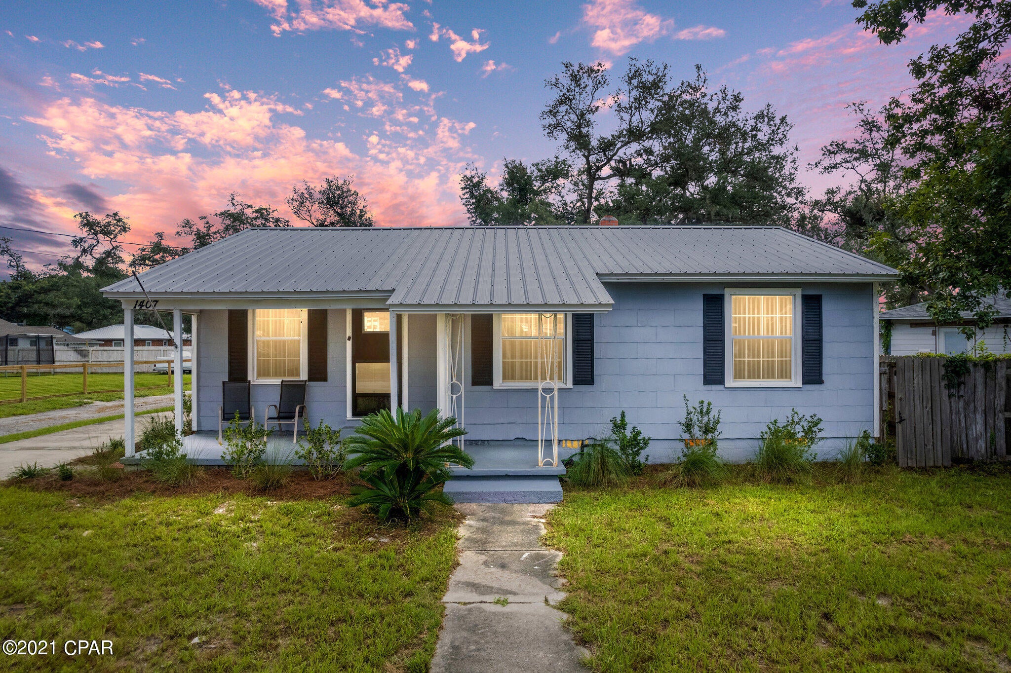 Quaint 3 bedroom 1 bath home with garage in Bunkers Cove. Original plumbing all the way to the street and electrical completely replaced, new roof in 2017 with hurricane clips in place. With the interior and exterior freshly painted and refurbished on the inside, this home is in pristine condition. 

What makes this property unique is the alley way access and no direct neighbors to the left. Walking distance to Dollar General and Cherry St Elementary School. Listing agent has an equitable interest in the property. Buyer to verify all info.