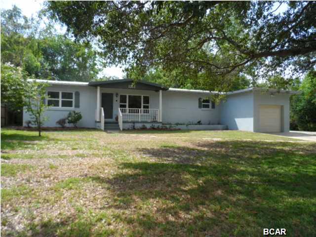OPEN HOUSE SUNDAY AUGUST 24th 2 to 4 PM. Quiet Lake Caroline area Cottage with Charming details plus Modern Amenities. This solid concrete block home features Gleaming Hardwood Floors, an Open Concept Floor Plan and split bedrooms on a Tree Shaded lot close to Beach Drive, Lake Caroline and great Parks. The Upgraded Kitchen is complete with Custom Cabinetry, New Stainless Appliances and a great bar area overlooking the dining and living Rooms. A separate Florida Room brings in lots of natural light and opens to a back yard deck, perfect for cooking outs. A spacious Master Retreat includes a nice Master Bath and a convenient separate Laundry Room. The 2 guestrooms share a hall bath and one has French Doors leading to the back deck. On the outside , you'll love the New Metal Roof,