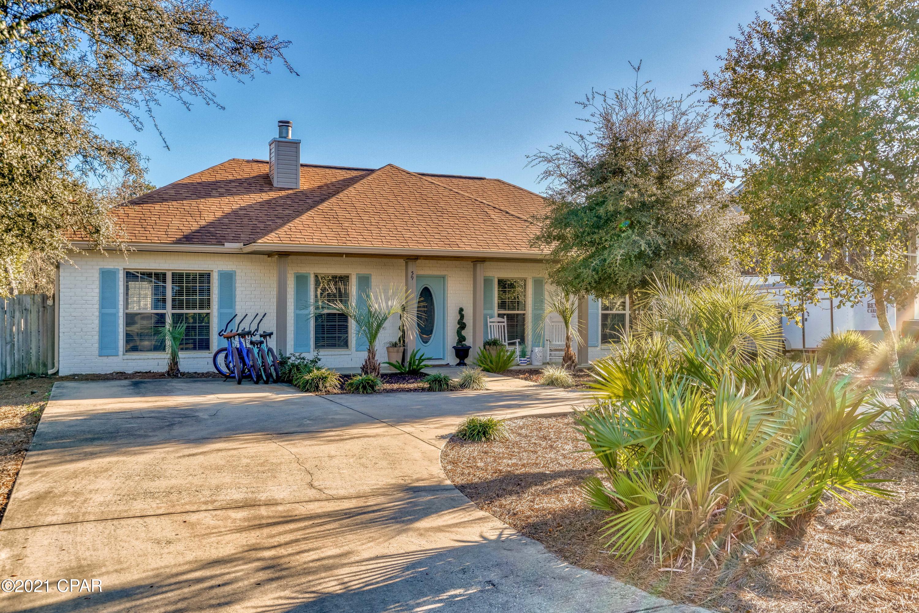 Welcome to 59 Woodland Drive in beautiful Santa Rosa Beach, Florida! This excellent one story home built in 2014 is located just off of Scenic Hwy 30-A and is a short stroll to multiple beach access points! The home is also very close to the thriving communities of Gulf Place and Blue Mountain Beach offering multiple restaurants, shops and entertainment for you to enjoy with many more new businesses to come! This home checks all of the boxes and would make an excellent primary, second or investment property. The open concept 4 bedroom, 2 bathroom home features an awesome fenced back yard, perfect for entertaining, with ample deck space and a basketball court that is sure to keep the kids and adults busy year round. The home has plenty of room to add a pool as well if the new owner wants.
