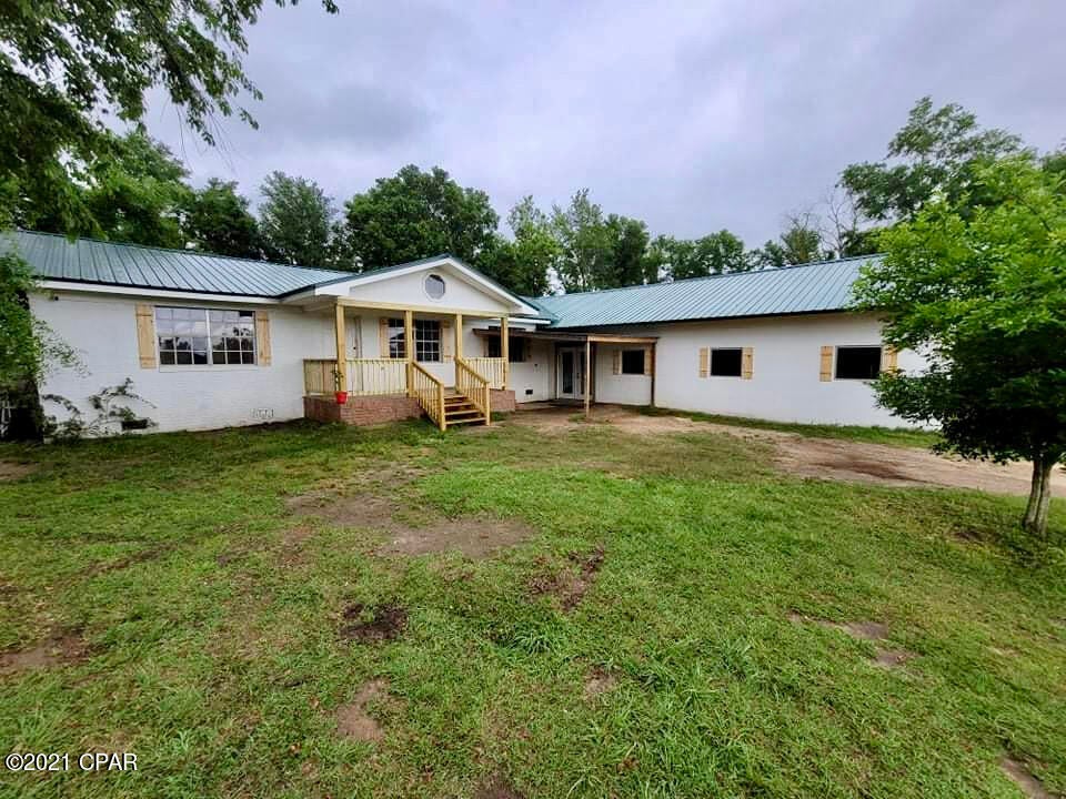 20 acre farm in Jackson County Fl. 3/2 brick/block ranch farm house completely remodeled.  Beautiful tongue and groove knotty pine boarding, large great room, spacious bedrooms, new wiring, new insulation, newer metal roof, new plumbing, fenced and crossed fenced ready for your cattle or horses.  Spare hand pump well for back up.  This is a must see.  Being sold separately is a list of equipment and cattle if buyer are interested.
