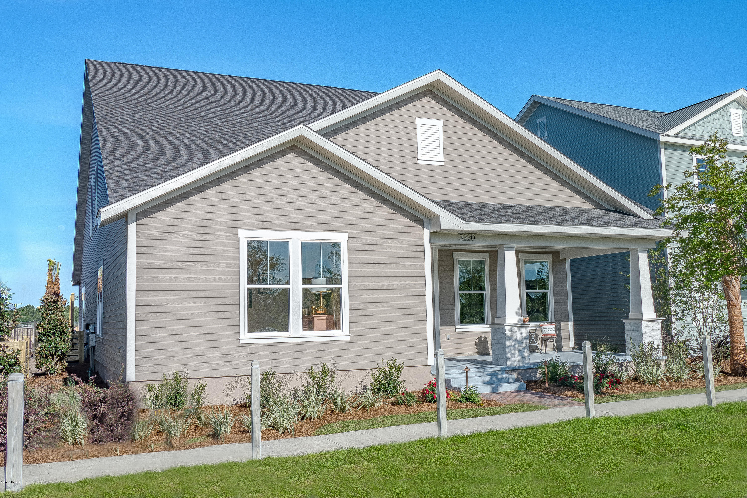 This house is a new construction Model Home Example and not the actual house being built. This home features the Marco I floor plan with Coastal Elevation.