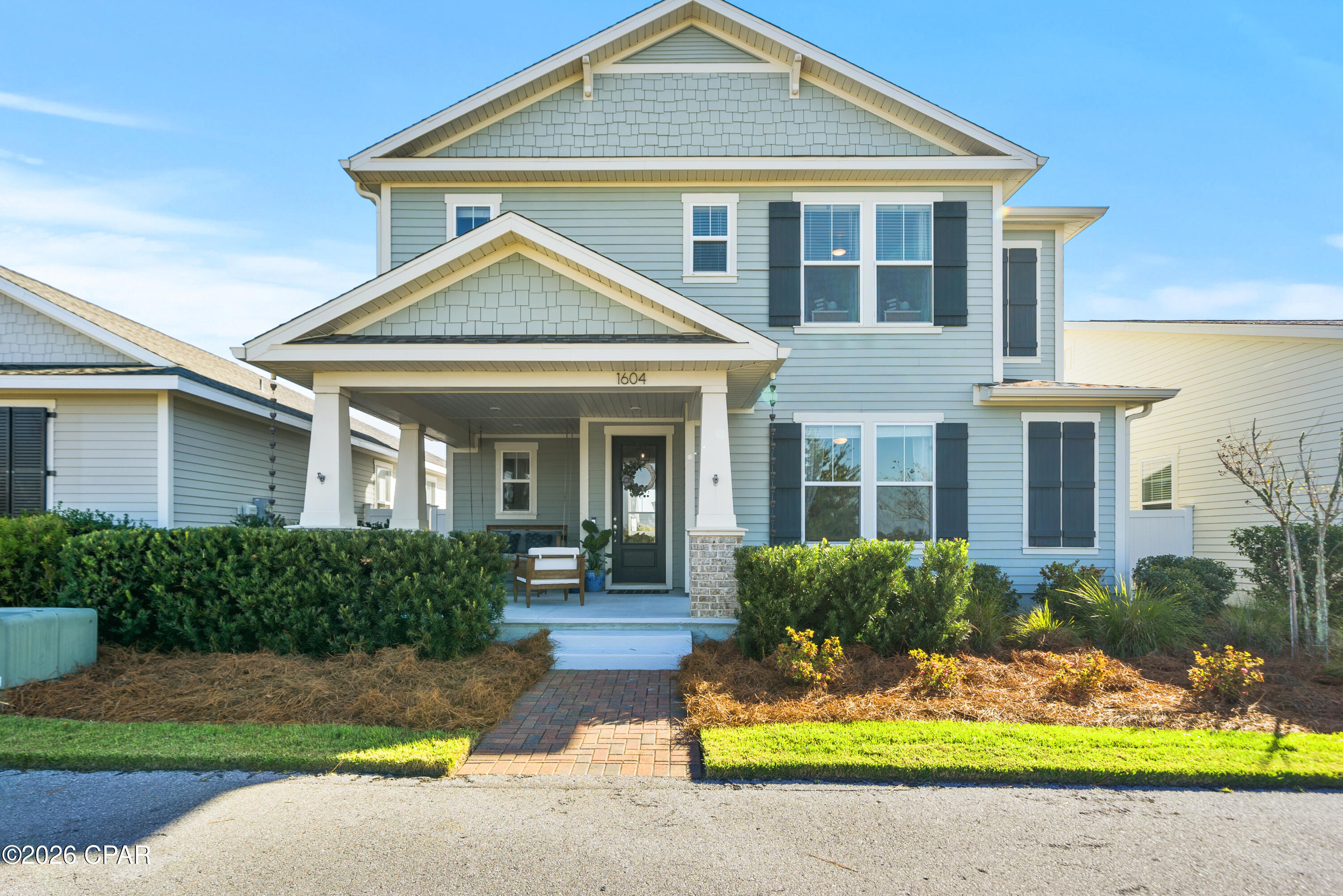 This beautifully maintained 4 bedroom, 3.5 bathroom home offers over 2,400 square feet of thoughtfully designed living space in one of Panama City's most sought-after communities. This Captiva floor plan with 2x6 exterior walls and hurricane tie-down rods offers superior construction. This home combines modern coastal style with functional living and an unbeatable lifestyle.

The en-suite downstairs is great for guests, an office, or a private mother-in-law suite. Inside, you'll find an open-concept floor plan with spacious living areas, abundant natural light, and designer finishes throughout. The kitchen features quartz countertops, ample cabinetry, and a large island overlooking the main living space, perfect for entertaining or everyday living.  The primary suite offers a private retreat with a spa-like bathroom and generous closet space, while additional bedrooms and loft provide flexibility for guests, office space, or growing families. 

Enjoy all that SweetBay has to offer, including a Town Center, resort-style pools, parks, walking trails, basketball court, playgrounds, a community dock with North Bay access, and golf cart friendly streets. Conveniently located near shopping, dining, medical facilities, downtown Panama City, and just a short drive to the beaches.

Move-in ready and positioned in one of Bay County's premier lifestyle communities, this is a rare opportunity you won't want to miss.