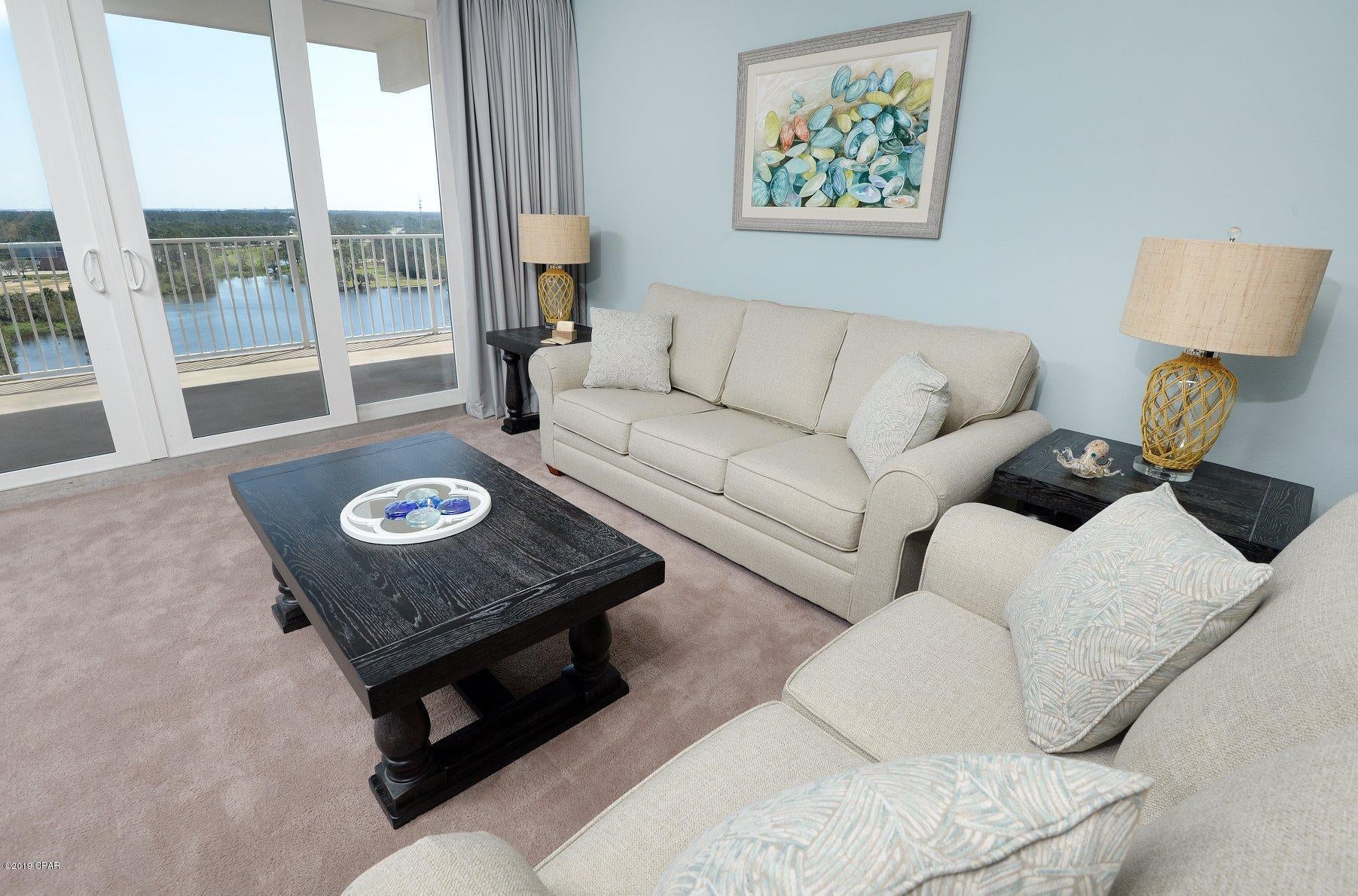 Three Bedroom lake view unit at Laketown Wharf Resort!!!!  In The Heart Of All The Fun & Excitement In Panama City Beach – Just Steps Away From The World's Most Beautiful White-Sand Beaches, Shopping, Dining & Entertainment. This Beachside Resort Offers Unparalleled Amenities With Convenient Beach Access, 5 Unique Pools, A Kids Funscape Playground, Splash Bar & Grill, Gulf View Fitness Center & Covered Garage Parking. Laketown Wharf Offers A Variety Of Views Including The Gulf Of Mexico, Lake & Golf Course. Enjoy The Nightly Fountain & Light Show & Market Shops Along The 52,000 Square Feet Of Lakefront Boardwalk. This Residence Has 3 Bedrooms 3 Baths, Bunk Room & Can Easily Accommodate Over 10 People. Features Include: New Furniture, Flooring & Paint, Exceptionally Large Open Floor Plan, Expansive Balcony, Granite Countertops, Fully Applianced Kitchen With Breakfast Bar. Multiple Views, Floor Plans & Floor Heights Also Available! Models Open Daily From 10-4! Call For More Details!