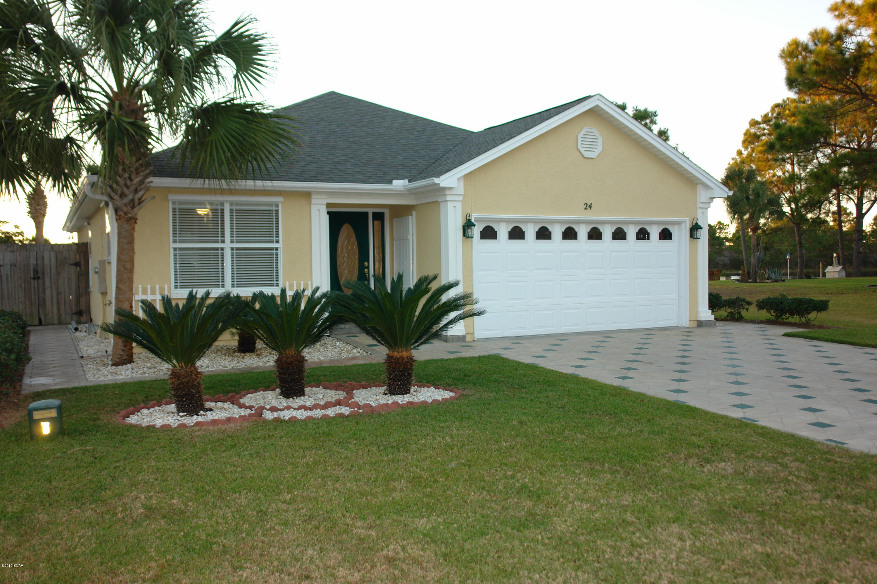 **  OPEN HOUSE FEB. 14th 1-4  ***  Fantastic house in the much sought after west end! Split bedroom plan with open living space in the center. This home offers tons of upgrades including Storm shutters, ceramic tile, wall to wall carpet, new a/c unit and new hot water heater, The home is being sold completely furnished including the washer and dryer. The beautifully appointed kitchen includes custom cabinets, side-by-side refrigerator and a flat top range. There are mirrored walls in the living area. The large back yard has an heated in-ground pool with cover, storage garage and lake fed irrigation system. Beach and lake access. The gated community provides security & privacy. Also, underground utilities at community. This is NOT a condo but fee simple home with neighborhood covenants & restrictions. This home has been well maintained and just like new! . Great area for year round residence or for a beach house. Beach access at end of the street! Quaint & out of the way great neighborhood in the perfect location!