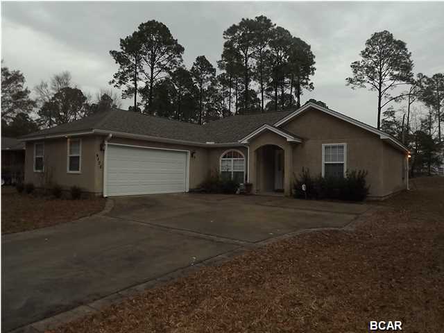 PRICE REDUCTION on This is a Beautiful Home in a quiet rural setting convenient to town. A spacious home that features a split floor plan, 3 bedrooms, 2 bath that was built in 2010. As you enter the home you are greeted by an open floor plan and a warm inviting fire place. The fully equipped kitchen includes all the matching appliances, a breakfast bar. The laundry room and both bath rooms have beautiful porcelain floor tiles. This home is spotless and is turn key. The exterior offer a large yard with a Patio Firepit/Grill. You are located close to three boat ramps for easy access to Deer Point Lake. This home is ready for a new family. So, make an appointment to see it today