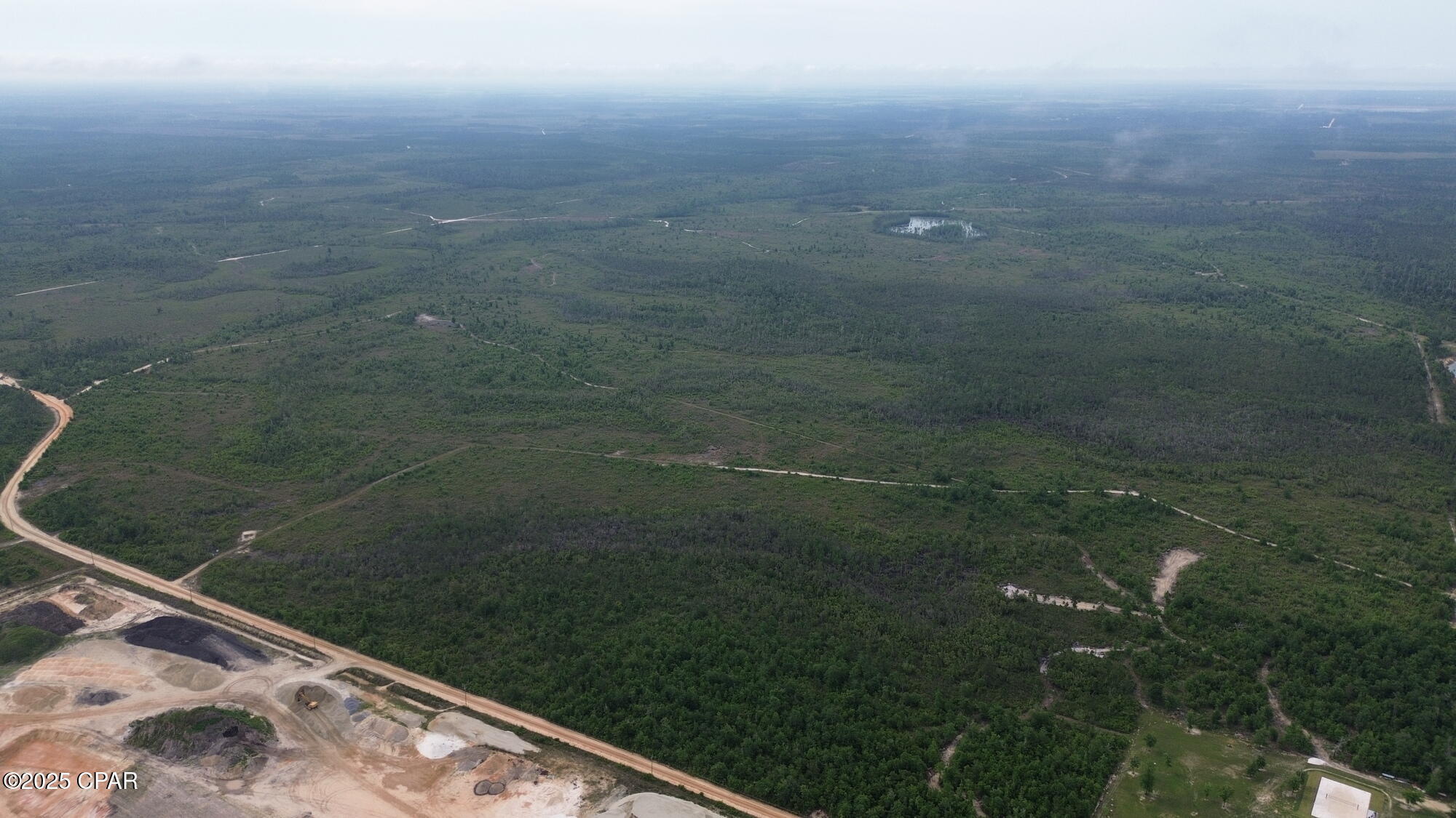 The subject +/-1,946 acre property is located on Old Majette Tower Rd and has .6 miles of frontage on John Pitts rd. Municipal utilities available to site along John Pitts Rd as well as the neighboring, Bay County owned HG Harder's
Park to the West. Currently under Panama City
Zoning - Silviculture. With a Future Land Use of
Urban Community the site is positioned for a large scale residential and commercial development. With access to Highway 231, the site allows for easy commuting to The Beaches of Panama City, Tyndall Air Force Base, and major transportation arterials.