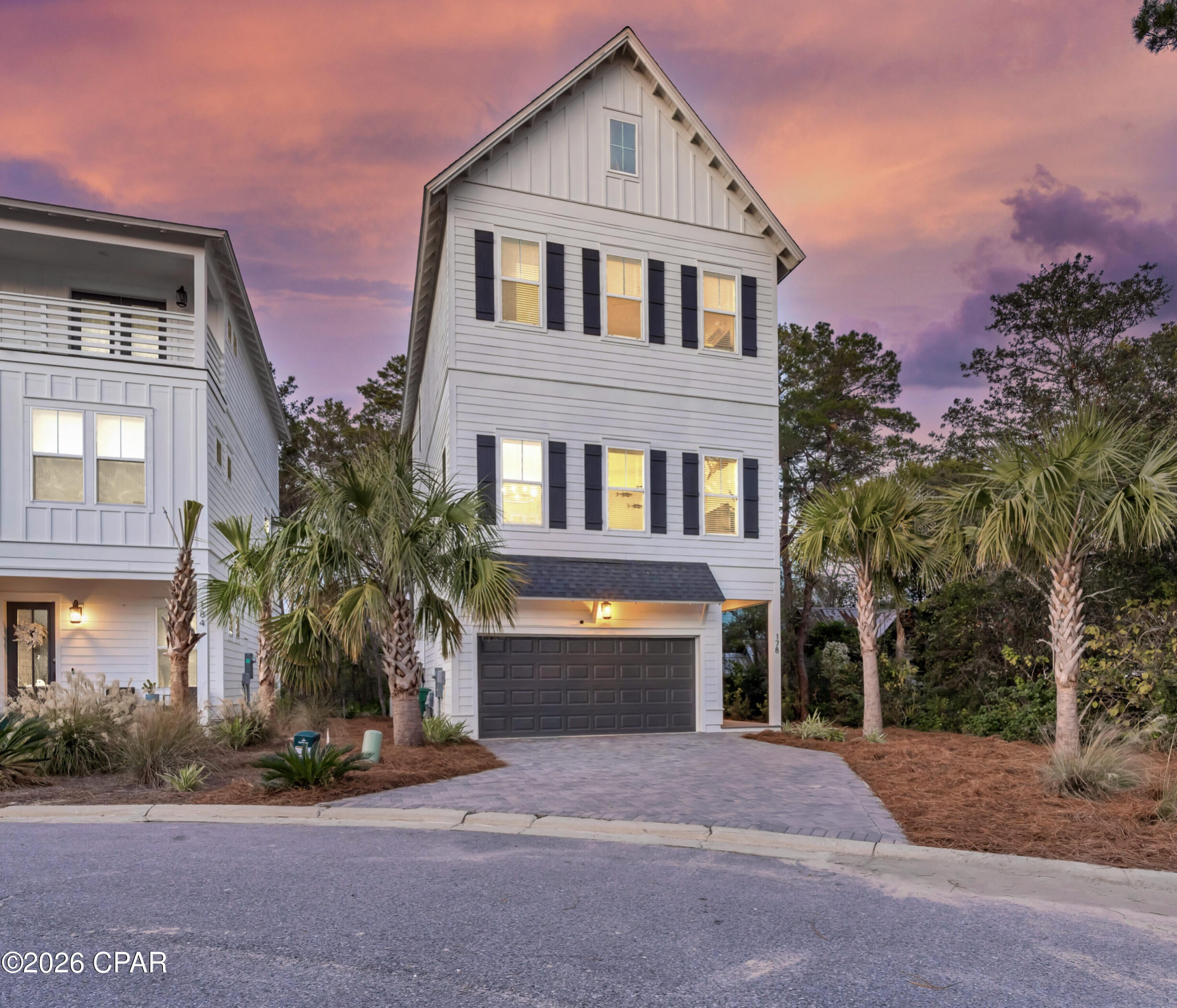 Fully furnished, STR-ready, and ideally located at the gateway to Scenic Highway 30A! This 2022-built coastal home offers 4 bedrooms, 3.5 baths, 2,483 square feet, a two-car garage, multiple balconies, and an established rental history--all less than a mile from the beautiful shores of Inlet Beach.

Designed across three spacious levels, the home comfortably sleeps up to 13 guests and features an open-concept living area, raised ceilings, hardwood and tile flooring, a large kitchen island, pantry, gas range, and multiple outdoor living spaces. The property is being offered fully furnished and includes five bicycles, beach equipment, and coolers, allowing a new owner to continue operating it as a vacation rental or begin enjoying it immediately as a second home.

The location places guests near Rosemary Beach, Camp Helen State Park, 30Avenue's shopping and dining, and the new pedestrian tunnel providing convenient passage beneath Highway 98 to the 30A corridor. The Ivy at Inlet Beach offers sidewalks and a shared community pool, and short-term rentals are allowed.

This property has already demonstrated strong rental potential, with reported gross rental revenue of $143,810 in 2024 under prior ownership. Reported 2025 revenue through September was $109,170, with approximately $21,000 in additional future bookings secured at that time. The property later changed ownership and management, creating an opportunity for a new investor to build upon its proven performance through optimized pricing, marketing, and guest amenities.

Additional opportunities may include adding a golf cart and enhancing the patio and outdoor entertainment areas to further increase guest appeal. Major systems, including the roof, HVAC equipment, and water heater, are reported as original to the 2022 construction.

Whether you are looking for an established short-term rental, a furnished coastal second home, or a property near Rosemary Beach and 30A, 178 Valdare Lane offers an appealing combination of location, rental history, modern construction, included guest amenities, and value-add potential.