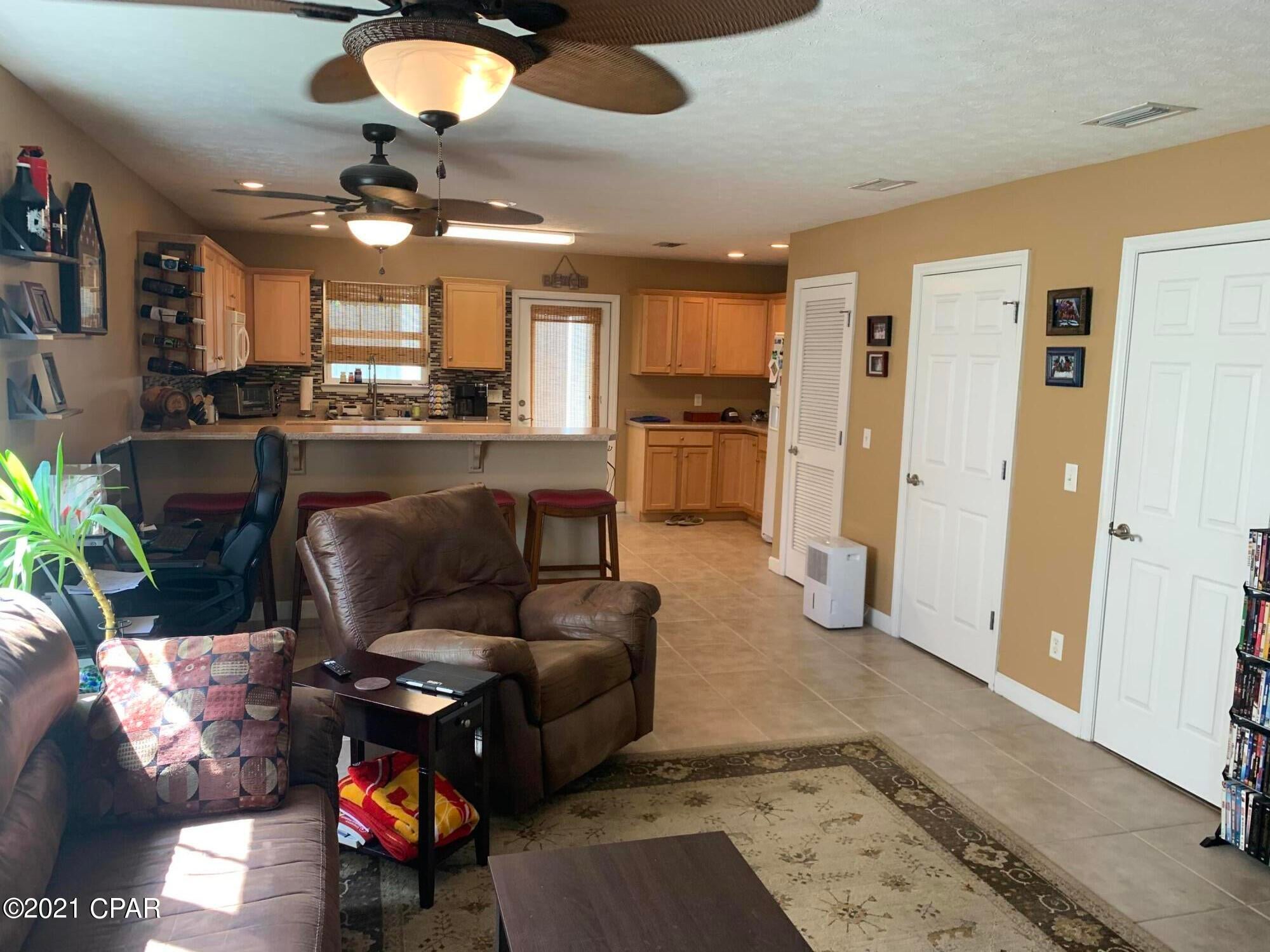 Celebrate the good life at The Gates of Sterling Cove!

So much value wrapped into this beautiful 2 bedroom/1.5-bathroom home.  Convenient upstairs laundry by the bedrooms.  Spacious storage closet on the back patio.  Wake-up and step-out onto the balcony for a touch of morning serenity.   Rest easy knowing the Seller is offering a Home Warranty!  This location is envied by the masses.  Close to the west-base of the Hathaway Bridge.  Easy access and close proximity to: Navy Dive Station; Hwy 98 East or West; Beaches; Tourism; Shopping and everything the east end of the Beach has to offer. Enjoy 1,152 sq ft of detailed upgrades including: recessed lighting; ceiling fans; the tankless water heater and smart garage door opener.  Enjoy awesome community amenities including: the refreshing pool, meticulous landscaping, termite bond, annual pressure washing, trash pick-up service and a scenic 400-meter walking trail.  Use the single car garage as additional storage, a place for your car, bike or other toys; maybe a She-Shed or Man-Cave. Don't miss out.  This will go very quickly!  Text listing Realtor for details.