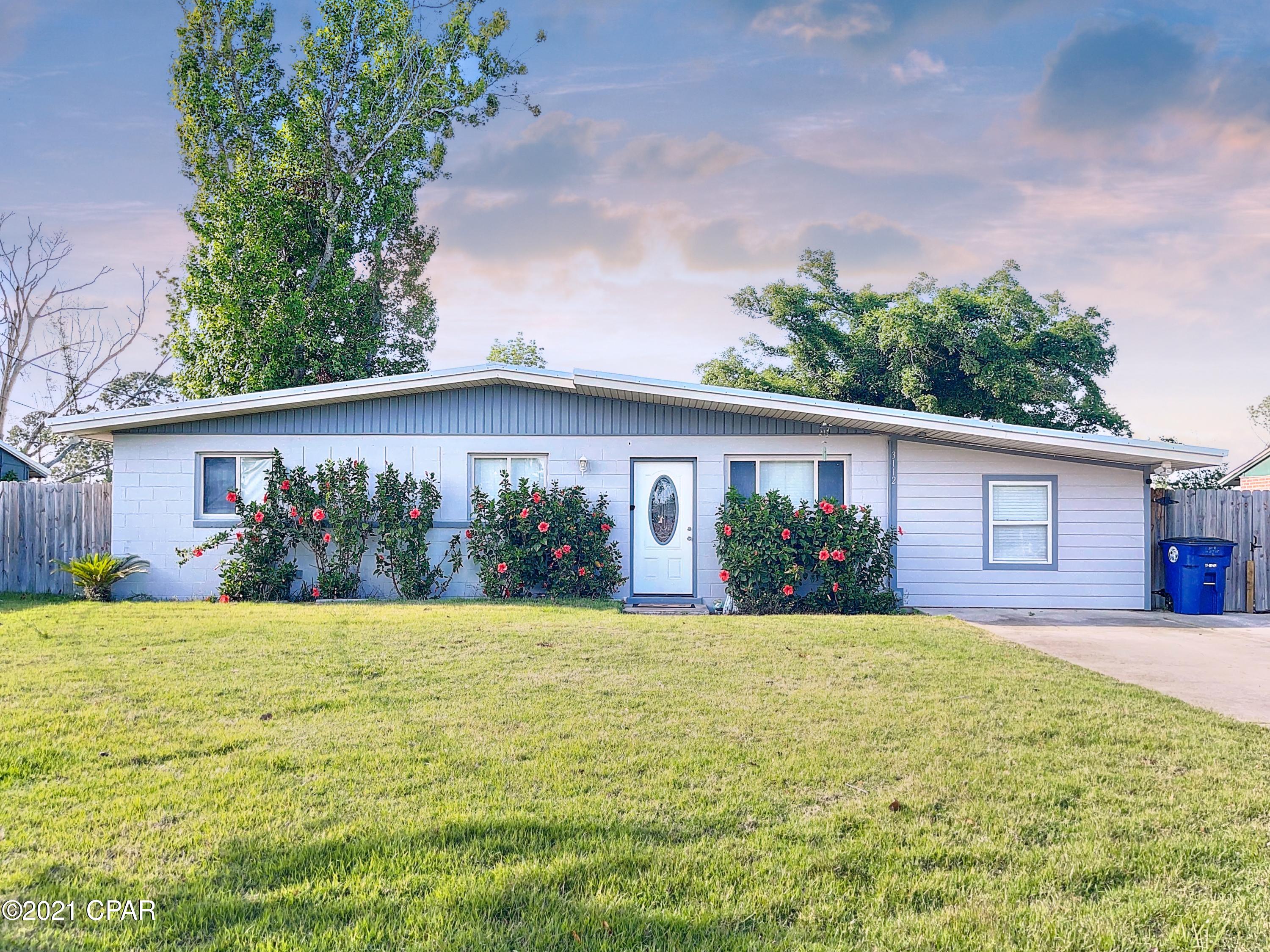 BACK ON MARKET with a REDUCED purchase price **BELOW market value** because seller needs to get a contract quick!!! ***FULLY REMODELED 4 BEDROOM/2 BATH HOME!!!*** There are so many unique features incorporated in this home! It is a must see in person!  Gorgeous kitchen with newer stainless appliances, countertops, cabinets, shiplap details, and so many unique features. New roof installed after hurricane Michael, however, there was no water damage or any issues. The home features 2 living rooms, so the family has plenty of room to spread out, along with plenty of room for a large dining table. There are 4 bedrooms and 2 bathrooms. One of the bedrooms has a beautiful sliding barn door leading to what could be a toy storage/play room, or extra large closet space. Master bedroom is nice size with ensuite bathroom. The driveway has plenty of space and a fully fenced backyard with a new paver patio. There is also a nice storage room with an exterior entrance on the back of the home, so be sure to check that out! Home is centrally located and is convenient to schools, shopping, only a 10-15 minute drive to the beach, and the grocery store is just one street over for great convienience! All info and measurements are approximate, Buyer to verify all information.