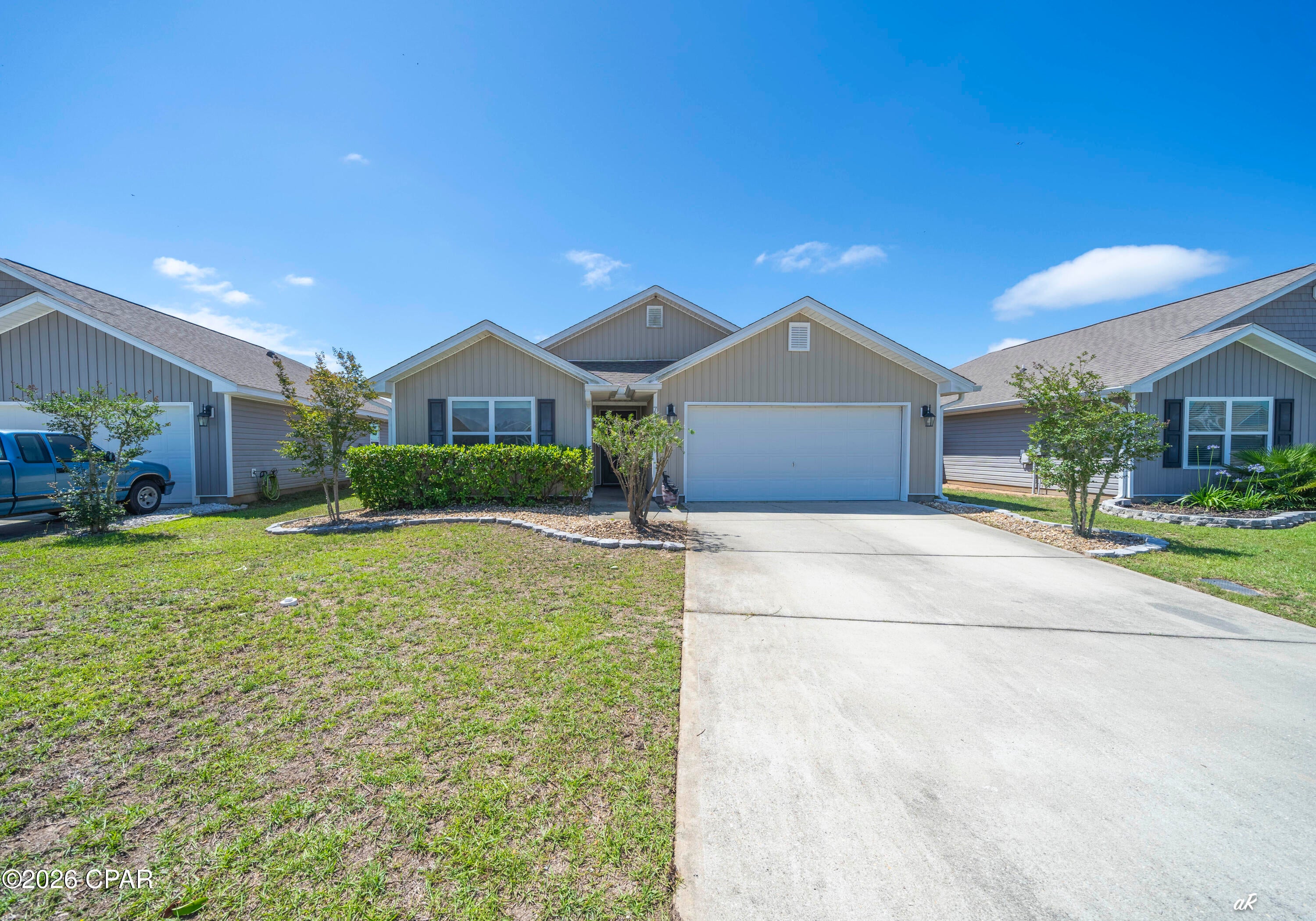 Quiet rental conveniently located north of Panama City in Barrett's Park Plantation. This home features 4 bedrooms and 2 full baths along with an open floor plan. The living area  has a built-in electric fireplace making it the focal point of the room. There is a LARGE master suite and upgraded flooring throughout the entire home. Privacy fenced yard all the way around and a 5 person hot tub on the screened in back porch for relaxing after a long day. This home is solar powered and leasing agent will explain power fees, usage and overage at viewing. All pets will be considered with fee. Call to schedule a viewing appointment. Discounter security deposit for Active Duty Military.