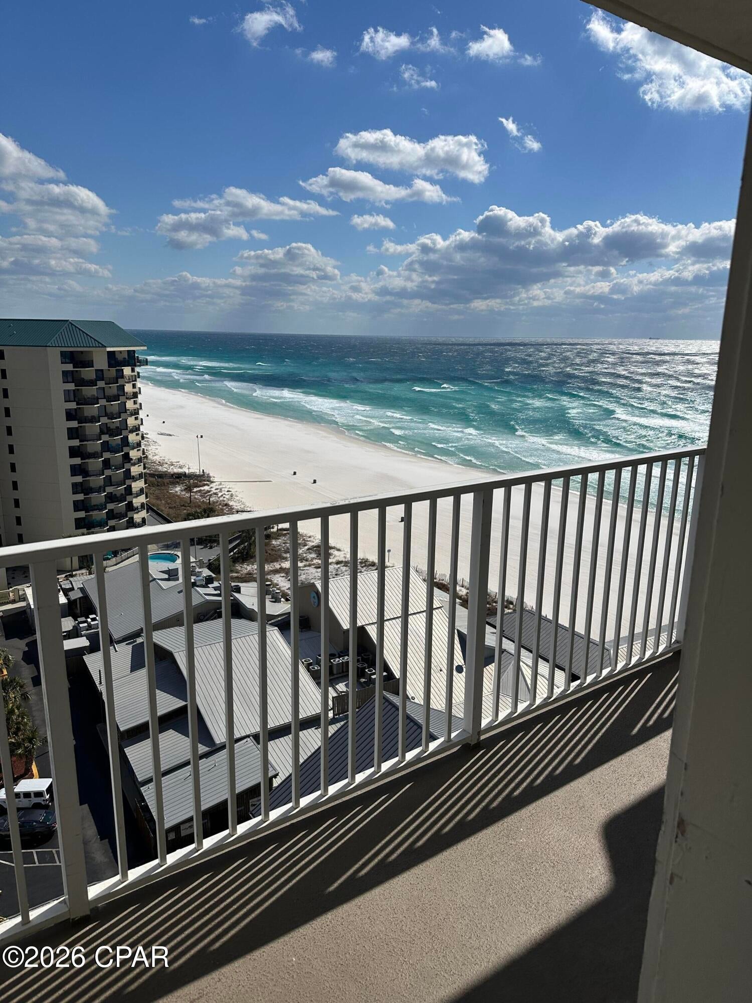 LOWEST PRICED ''N'' Floor Plan at the Shores of Panama! Discover exceptional value and breathtaking views in this 12th-floor Gulf-view condo at Shores of Panama, ideally positioned in the heart of Panama City Beach. Priced at $310,000, this 936-square-foot condo presents one of the best opportunities in the resort for both personal enjoyment and rental performance. Thoughtfully designed, the layout includes one private bedroom overlooking the emerald waters, two full bathrooms, and a separate bunk room that comfortably accommodates additional guests--making it ideal for maximizing occupancy and rental income. The open-concept living and dining area flows seamlessly into a fully equipped kitchen, creating a welcoming space for entertaining or relaxing after a day at the beach.

Step onto your private balcony and take in panoramic Gulf views, coastal breezes, and unforgettable sunsets. Additional conveniences include in-unit laundry and the benefit of being sold fully furnished--turnkey and ready for immediate enjoyment or rental placement.

The condo conveys fully furnished and rental-ready, making it an effortless investment opportunity or turnkey beach retreat. This unit also includes one deeded parking space. 
Shores of Panama is home to the largest Gulf-front lagoon pool in Panama City Beach, with its spectacular 14,000+ sq ft zero-entry lagoon pool with palm-lined islands, fountains, and expansive hot tub. tropical palm islands, fountains, and an oversized hot tub--all just steps from exclusive beachfront access. Owners and guests also enjoy:  Indoor heated pool and hot tub, 24-hour fitness center, Seasonal poolside Tiki bar, Covered parking, and On-site security.
The location is unbeatable--walk next door to Pineapple Willy's for beachfront dining or cross the street to Laketown Wharf for multiple dining options including The Wharf Buffet, Juan Taco, and LuLu's Bar & Restaurant. Shopping, entertainment, and attractions are all within easy reach.
If you're looking for a well-positioned Gulf-front condo with proven rental appeal and unbeatable amenities--this is a standout opportunity. With exterior renovations scheduled to enhance curb appeal and long-term value, this is a strategic opportunity to secure this wonderful gulf front condo--ideal as a personal retreat, income powerhouse, or both. All information and HOA details are believed accurate but should be verified by buyers if important.