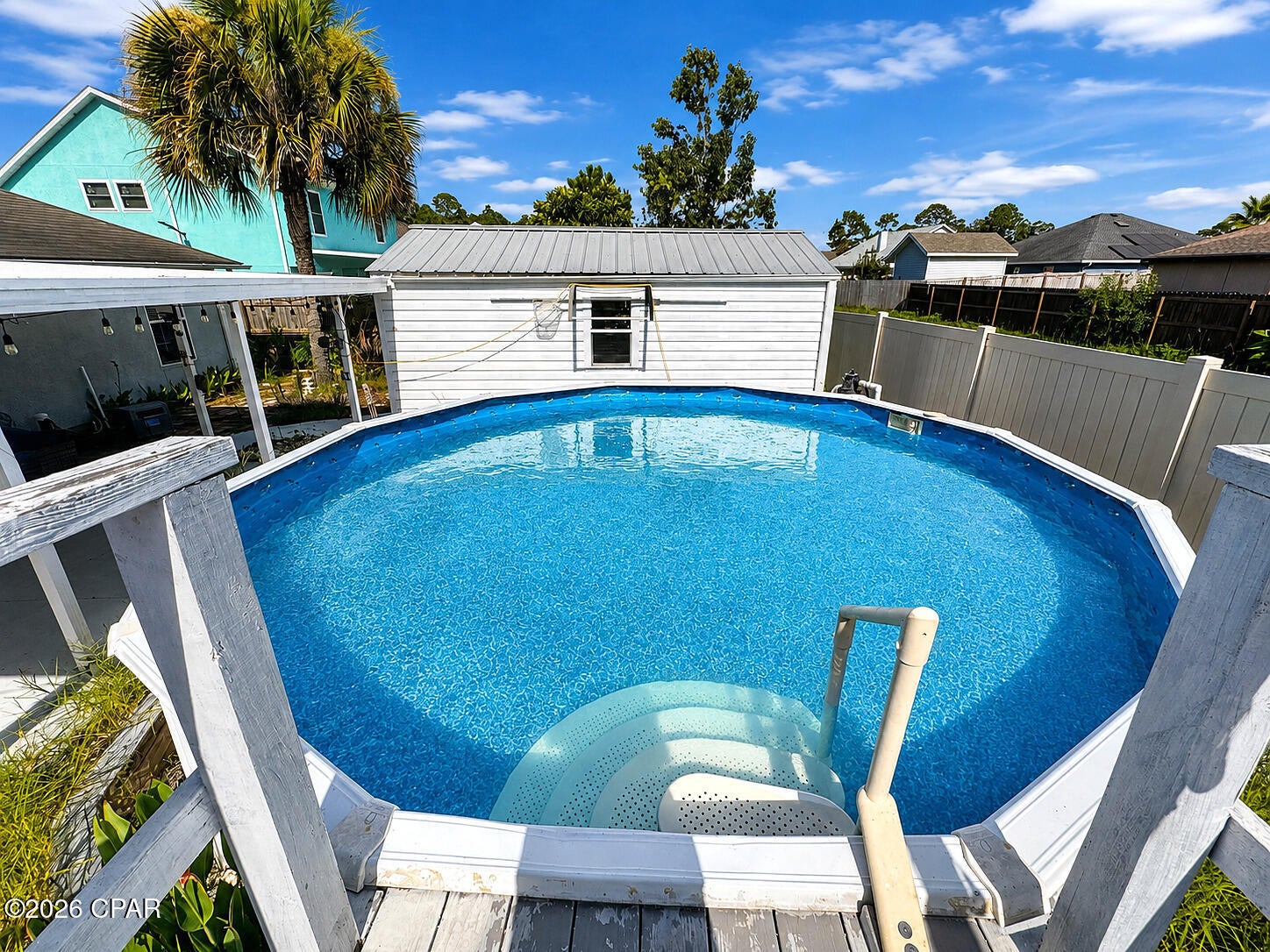 Wow! Make every day feel like a Florida getaway at this spacious 4-bedroom, 2-bath Panama City Beach home! Offering approximately 1,500 square feet, this inviting property combines comfortable indoor living with an impressive private outdoor retreat.

Inside, you'll find an open living and dining area, easy-care tile flooring, a cozy fireplace, cathedral ceilings, and a bright eat-in kitchen with a breakfast bar and plenty of cabinet space. The split-bedroom layout offers added privacy, while four bedrooms provide flexibility for sleeping space, a home office, hobbies, or guests.

Step through the French doors into the screened sunroom, then continue outside to the covered patio, fenced backyard, and refreshing saltwater pool--perfect for relaxing, entertaining, and enjoying the Florida sunshine. A garage and separate workshop/storage building provide valuable room for vehicles, beach gear, tools, and everyday storage.

Conveniently located near Panama City Beach's beautiful white-sand beaches, shopping, dining, entertainment, and the Navy base, this home puts the best of the area within an easy drive.

Homes with this much space, storage, and outdoor enjoyment are hard to find. Schedule your showing today and come see everything 7115 Brandywine Drive has to offer!