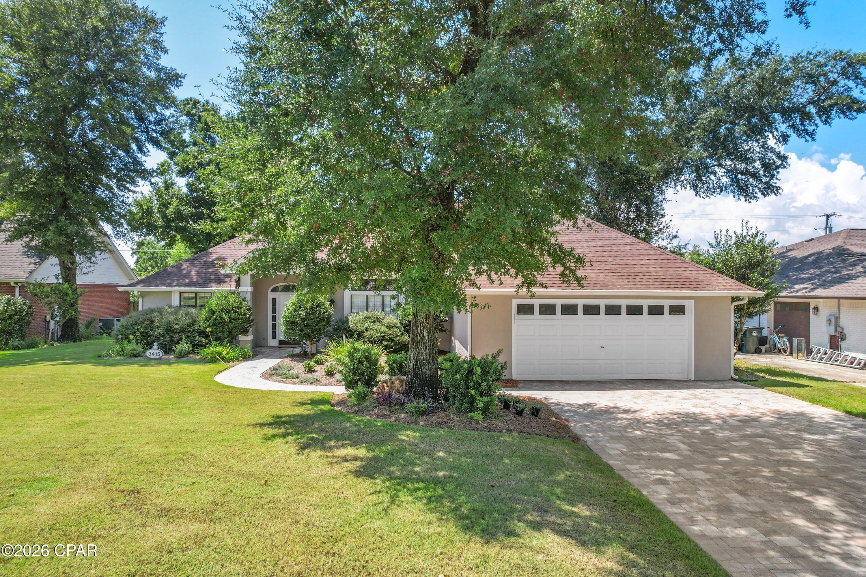 Enjoy quiet cul-de-sac living and the country club lifestyle in this move-in-ready 3-bedroom, 2-bathroom home in Lynn Haven's Panama Country Club neighborhood. Tucked away on a low-traffic road just off the main circle, this home offers privacy and a peaceful setting. Located just a block from the water, the community is perfect for golf cart rides and enjoying the coastal lifestyle. An optional country club membership offers access to the private 18-hole golf course, bayfront dining at the clubhouse, gym, dock, and pool.
Inside, the home features LVP flooring throughout, new countertops, updated light fixtures, fresh paint, and a generator. The spacious layout includes a large Great Room anchored by an electric fireplace, with sliding glass doors that open to the porch area, along with a formal dining room, custom kitchen, breakfast nook, Florida Room/Office, and oversized laundry room. The split-bedroom floor plan provides added privacy, with a spacious primary suite featuring a large dressing area, double vanity, and walk-in closet.
Step outside to enjoy the private backyard and open porch. 
All information is deemed reliable but should be verified by the buyer. Call today to schedule a private showing!
